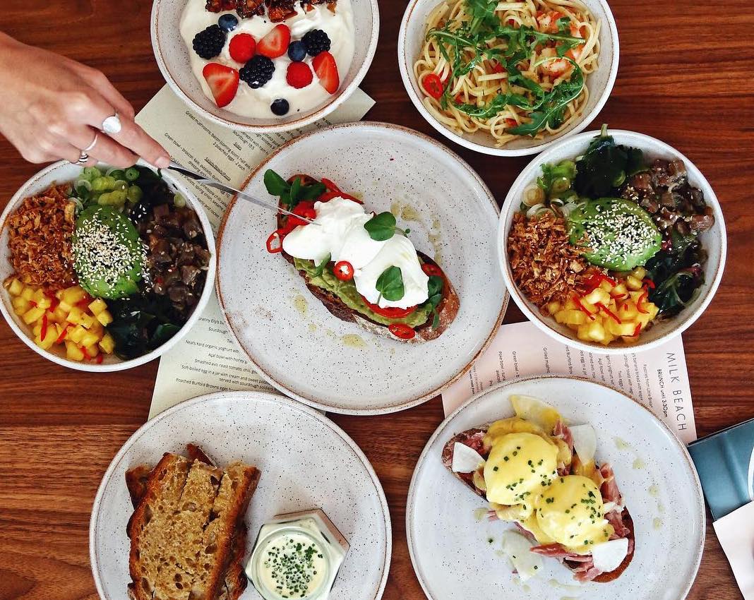 Avocado toast, poke bowls and granola with yoghurt at all-day dining restaurant Milk Beach in Queen’s Park, north west London