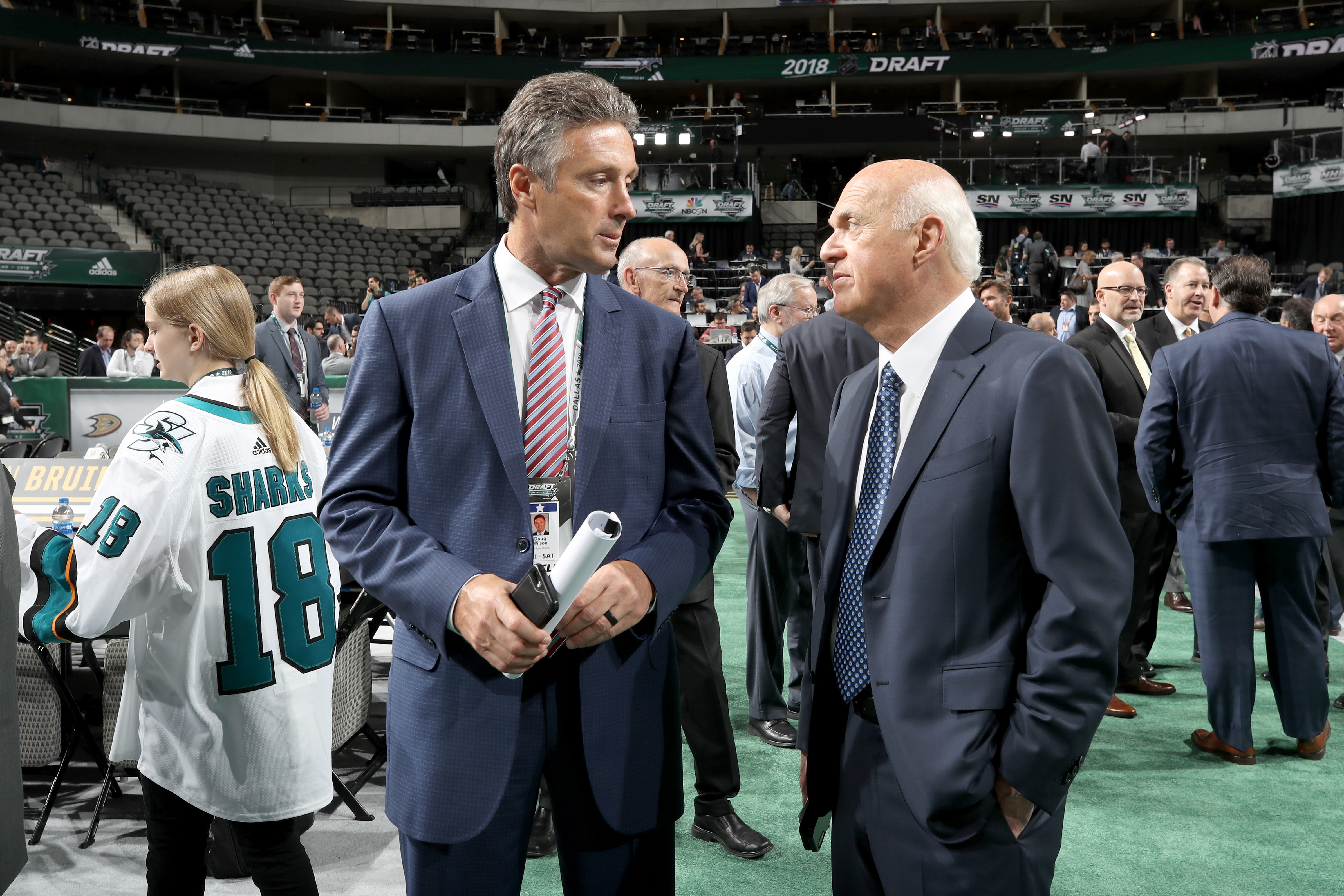 DALLAS, TX - JUNE 22: (l-r) Doug Wilson of the San Jose Sharks and Lou Lamoriello of the New York Islanders chat prior to the first round of the 2018 NHL Draft at American Airlines Center on June 22, 2018 in Dallas, Texas.