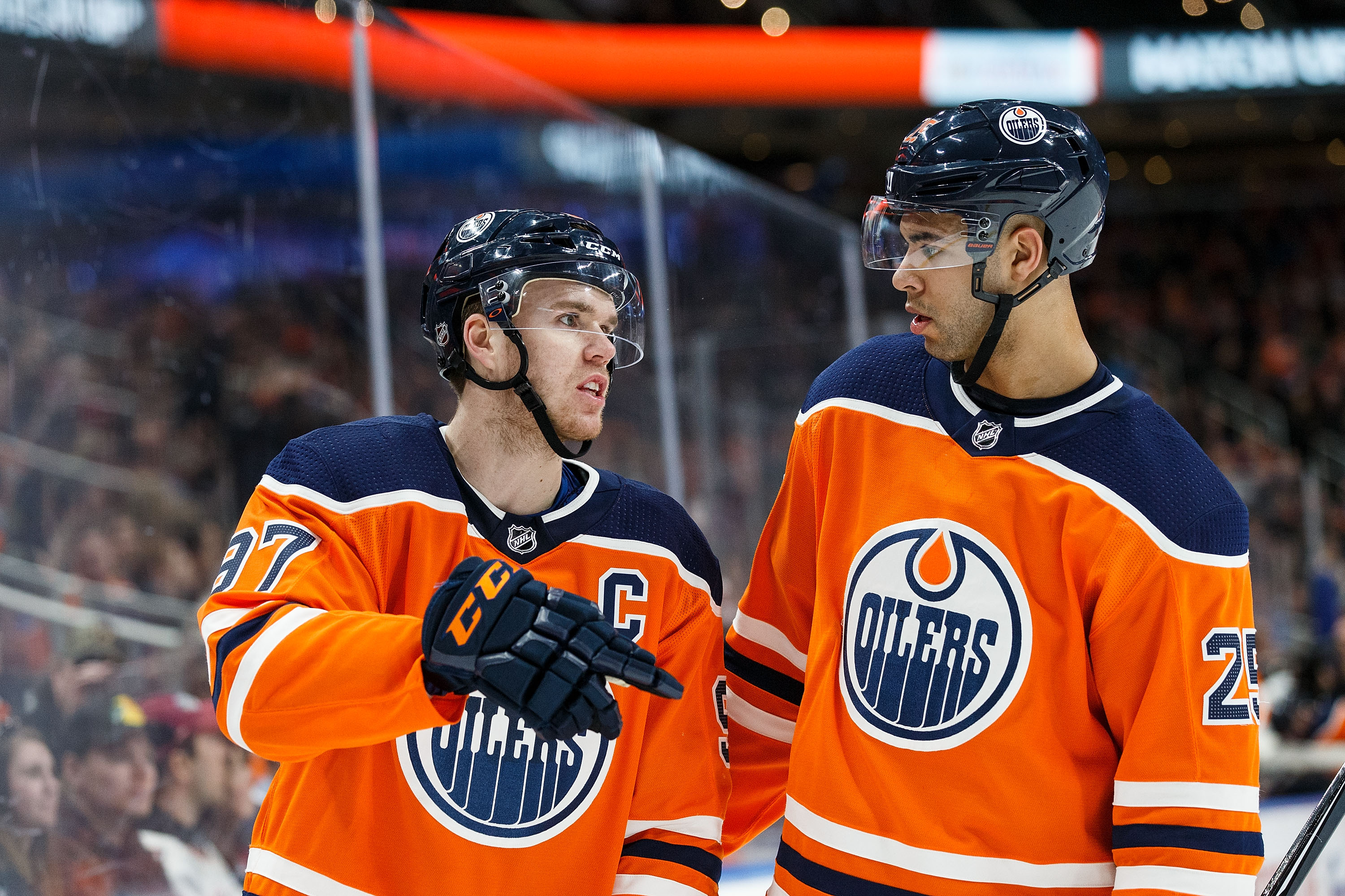 EDMONTON, AB - APRIL 05: Connor McDavid #97 and Darnell Nurse #25 of the Edmonton Oilers strategize during a break in play against the Vegas Golden Knights at Rogers Place on April 5, 2018 in Edmonton, Canada.