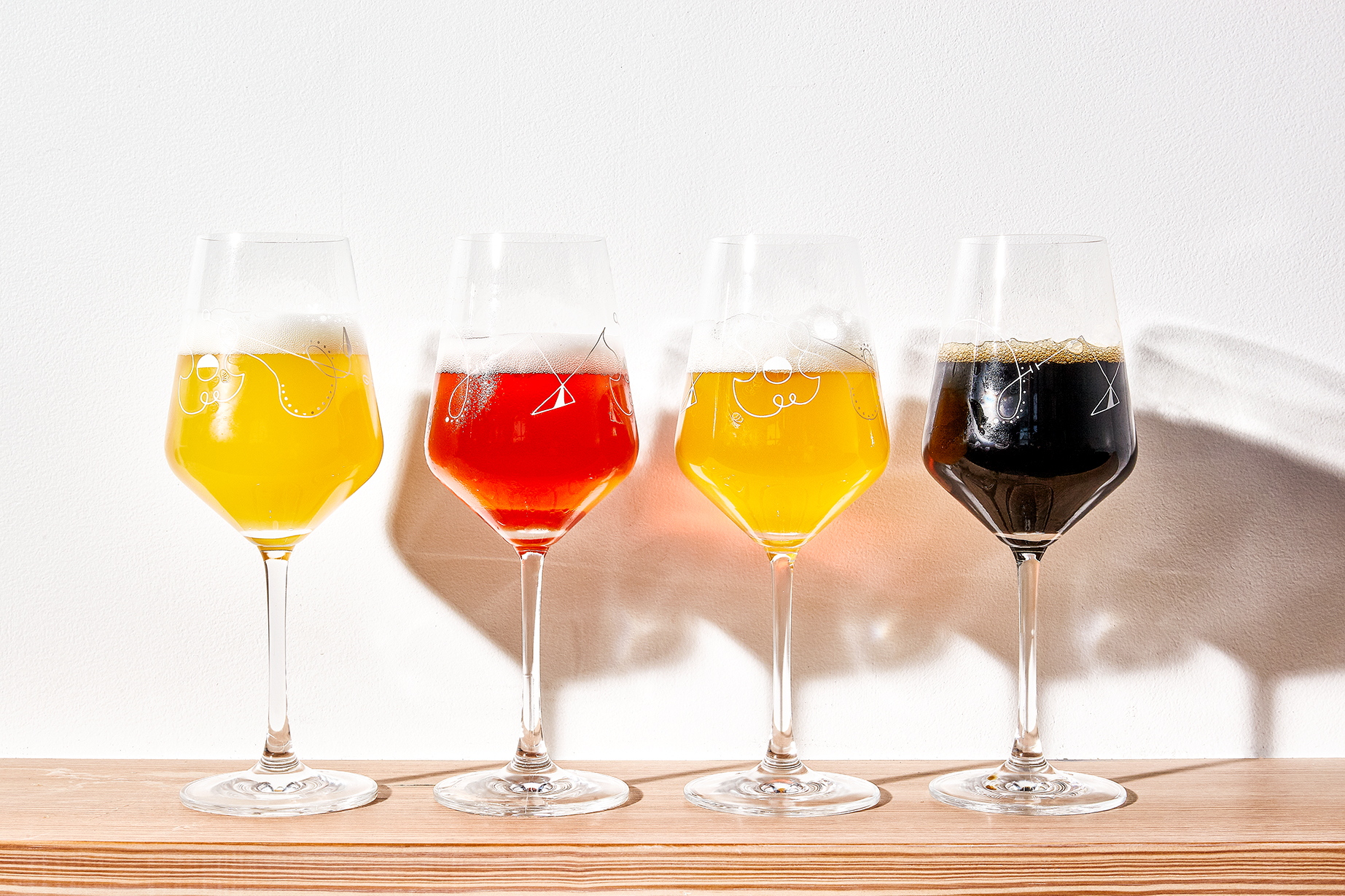 An assortment of four colorful beers from Grimm, a brewery based in East Williamsburg.