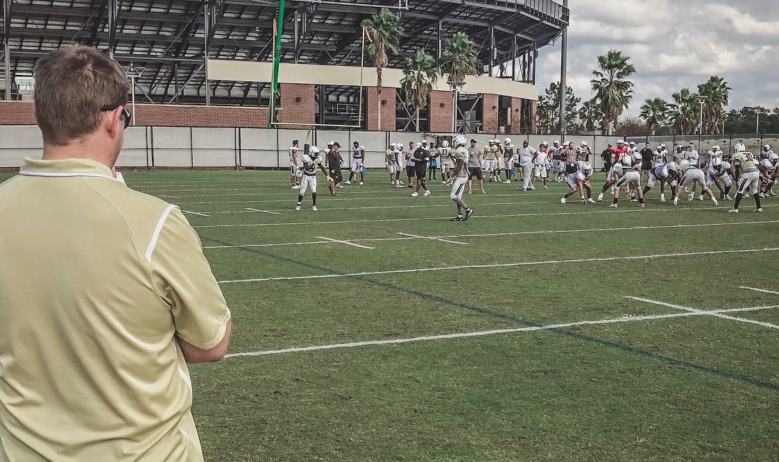 New UCF head coach Josh Heupel took time out from confirming recruits Wednesday to watch the current Knights practice for the upcoming Peach Bowl. (Photo: UCF Football's Twitter feed)