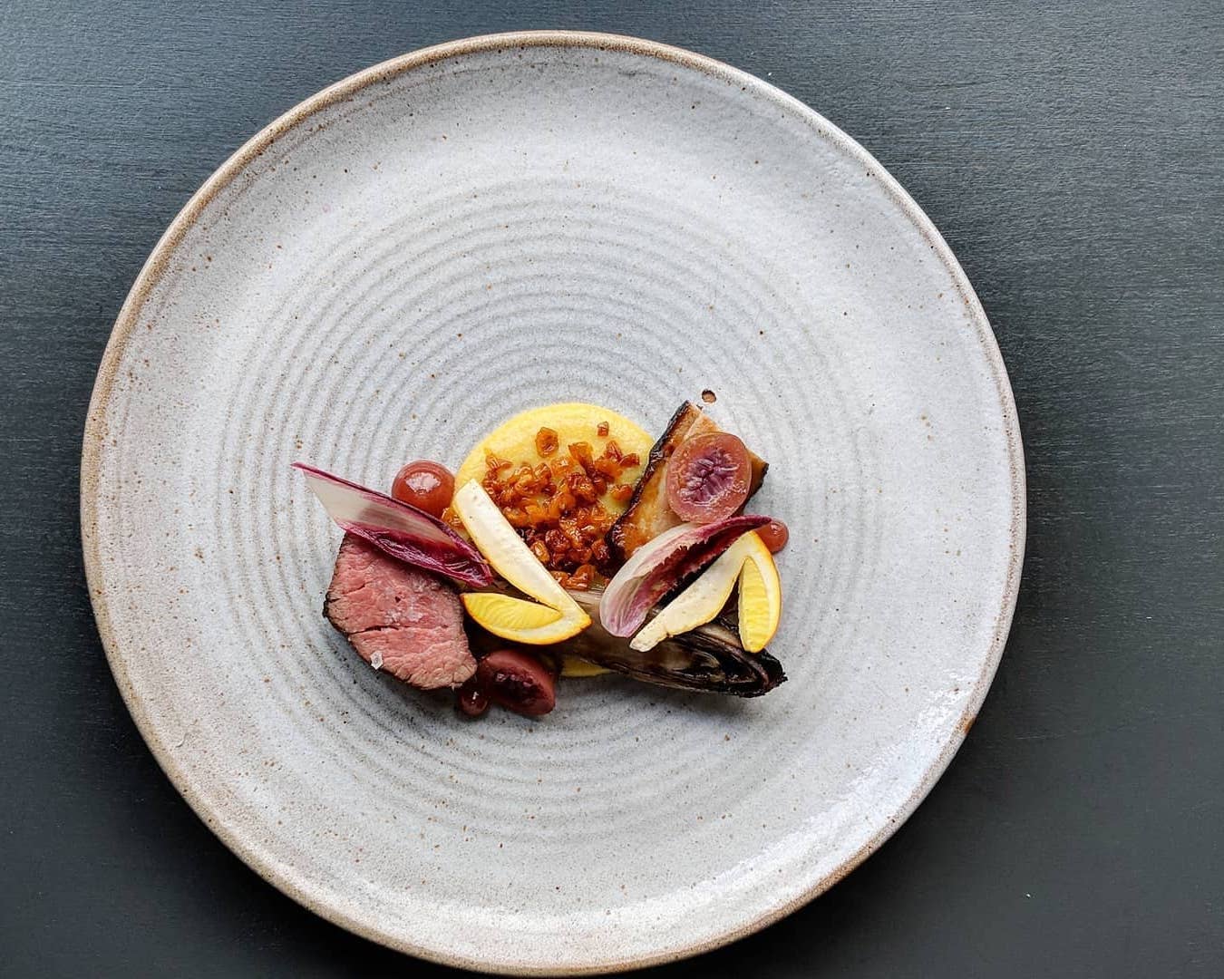 Iberico pork, chicories, gooseberry, ovuli mushroom at Pidgin restaurant in Hackney, which will make its weekly menu a mystery — it won Best Restaurant at the Observer Food Monthly Awards in 2017