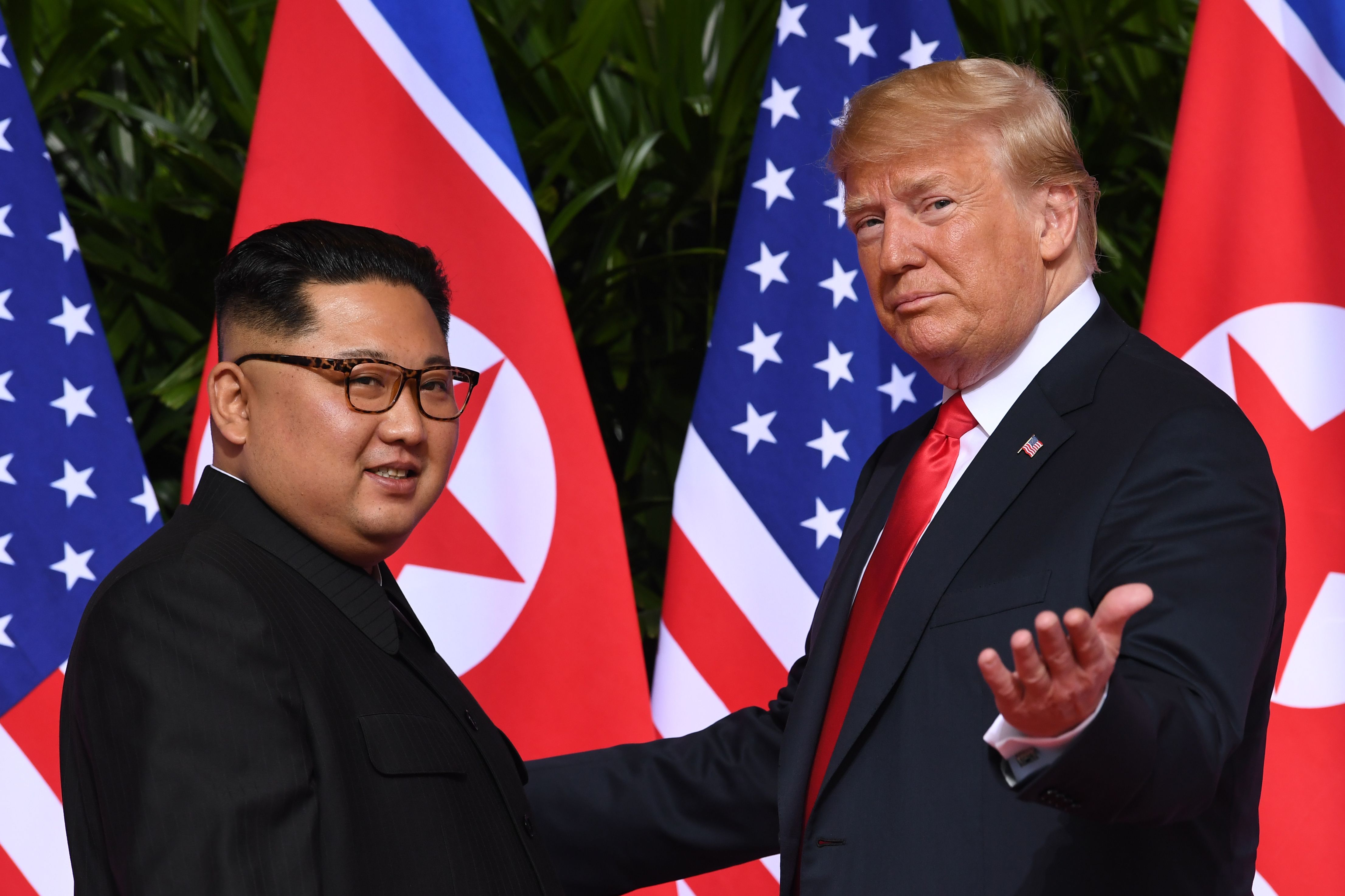President Donald Trump meets with North Korea’s leader Kim Jong Un at the start of their summit in Singapore on June 12, 2018.