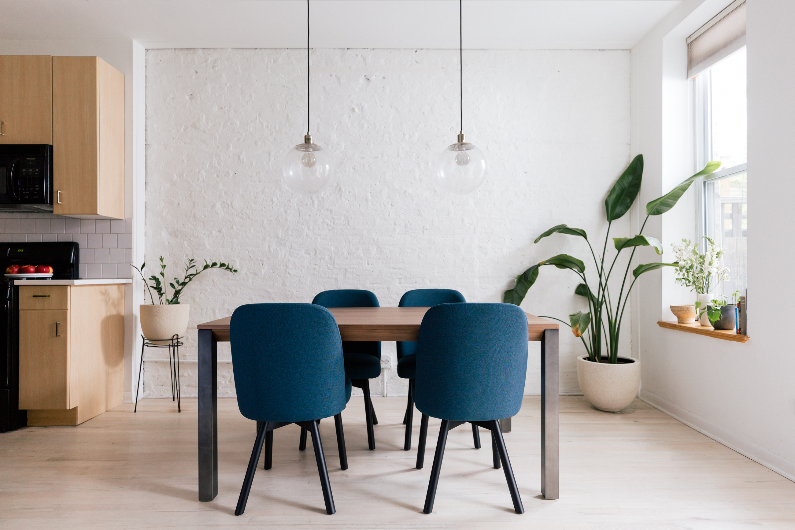 modern dining table and upholstered chairs