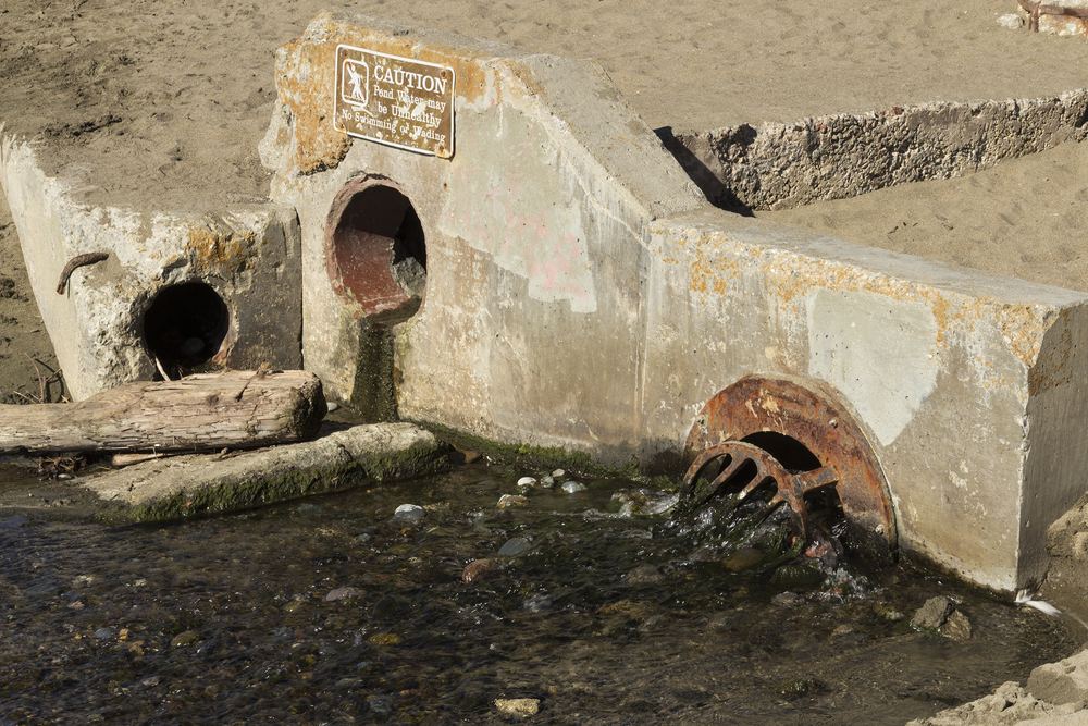 Old, rusted, crumbling drains on Ocean Beach.