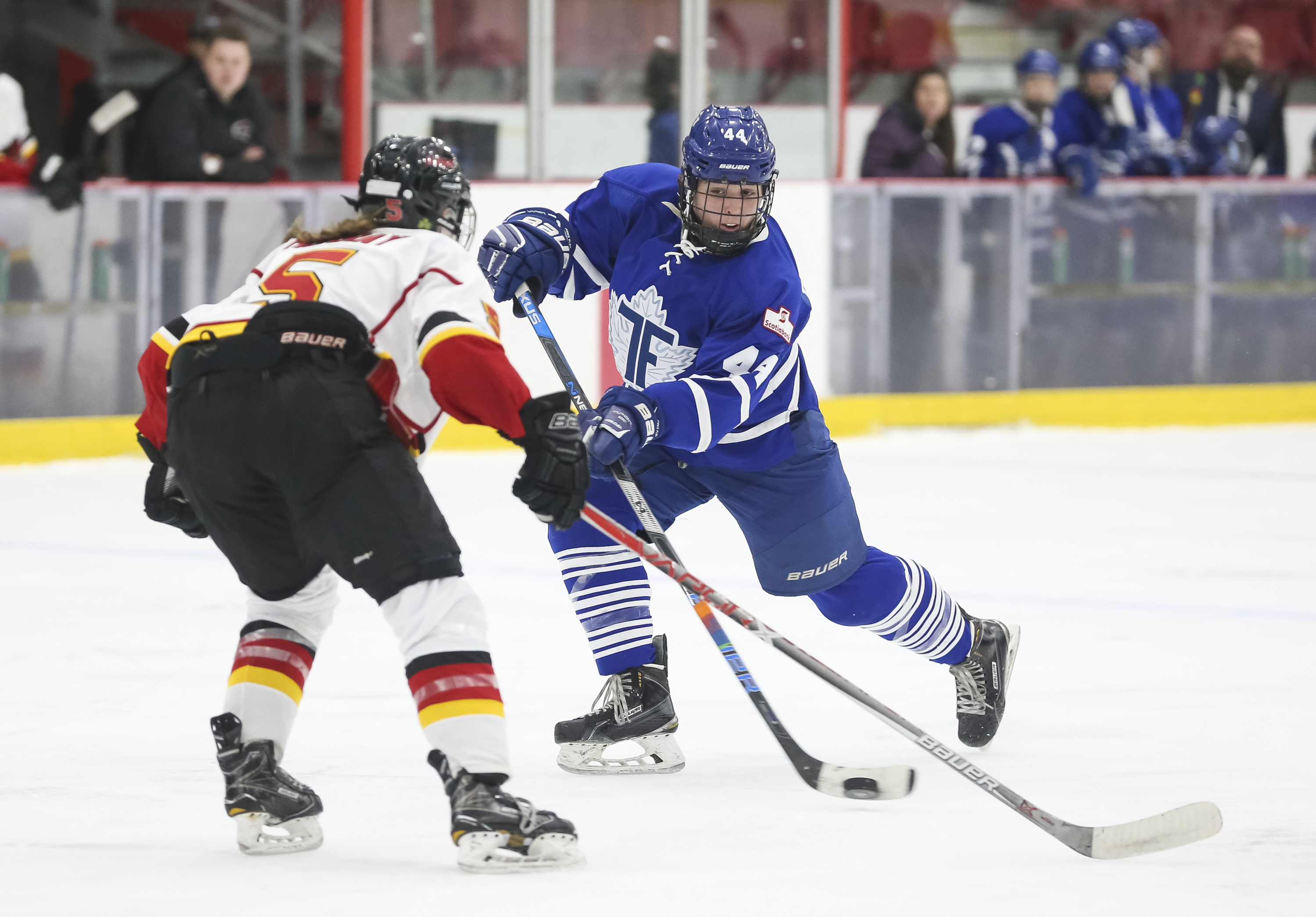 Jenna Dingeldein (44) of the Toronto Furies battles Kelly Murray (5) of the Calgary Inferno.