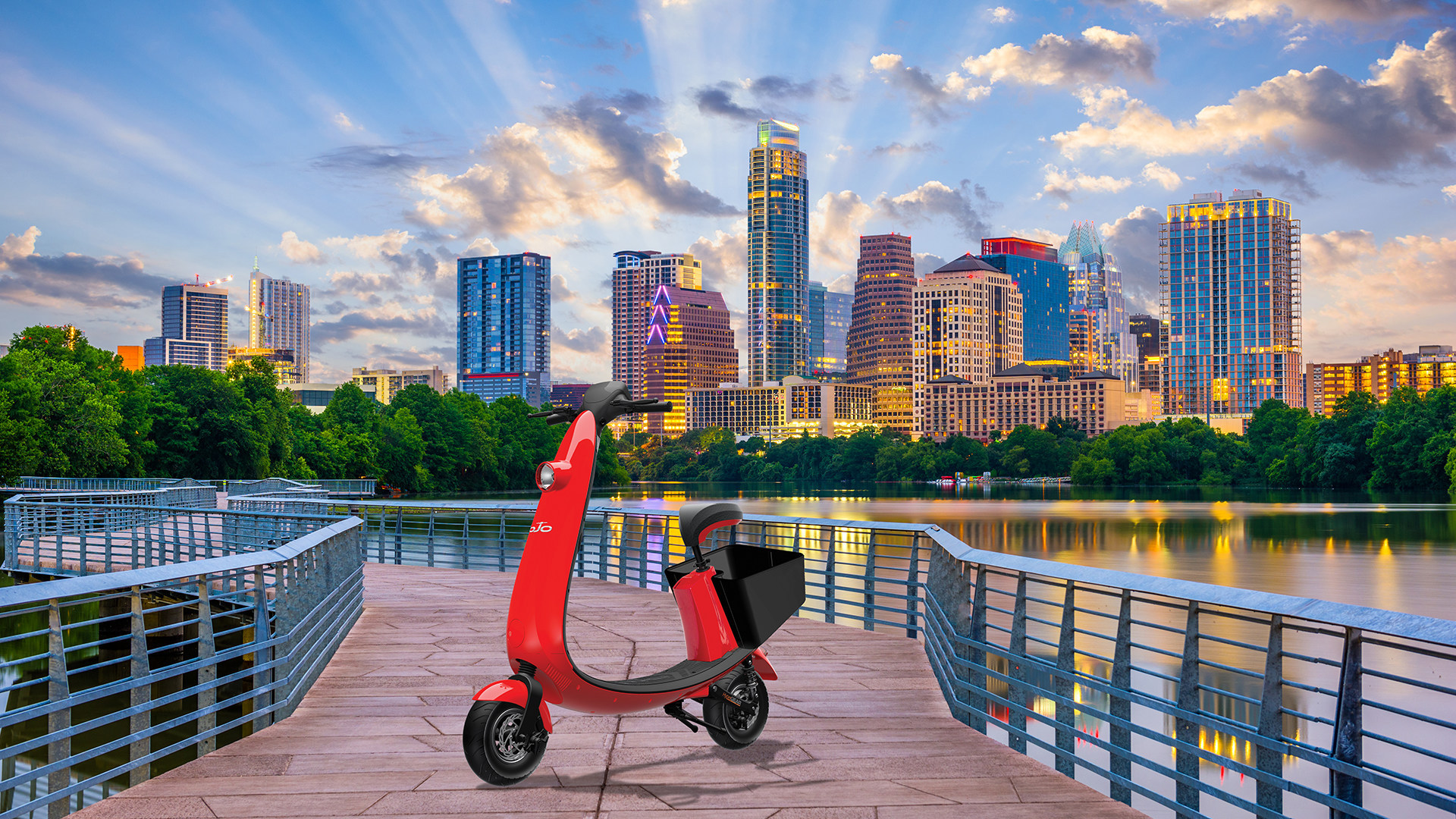 Red scooter in front of Austin skyline
