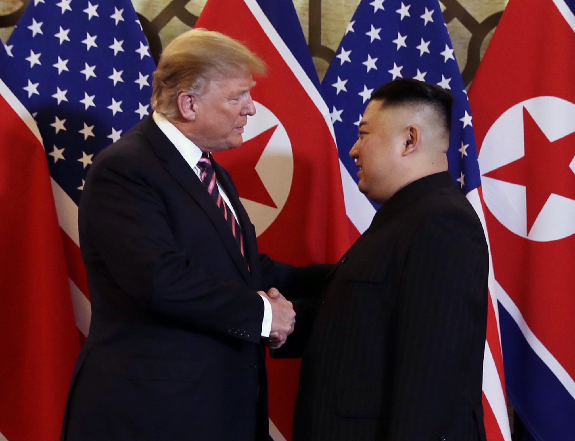 President Donald Trump and North Korean leader Kim Jong Un shake hands to start their summit in Hanoi, Vietnam on February 27, 2019.