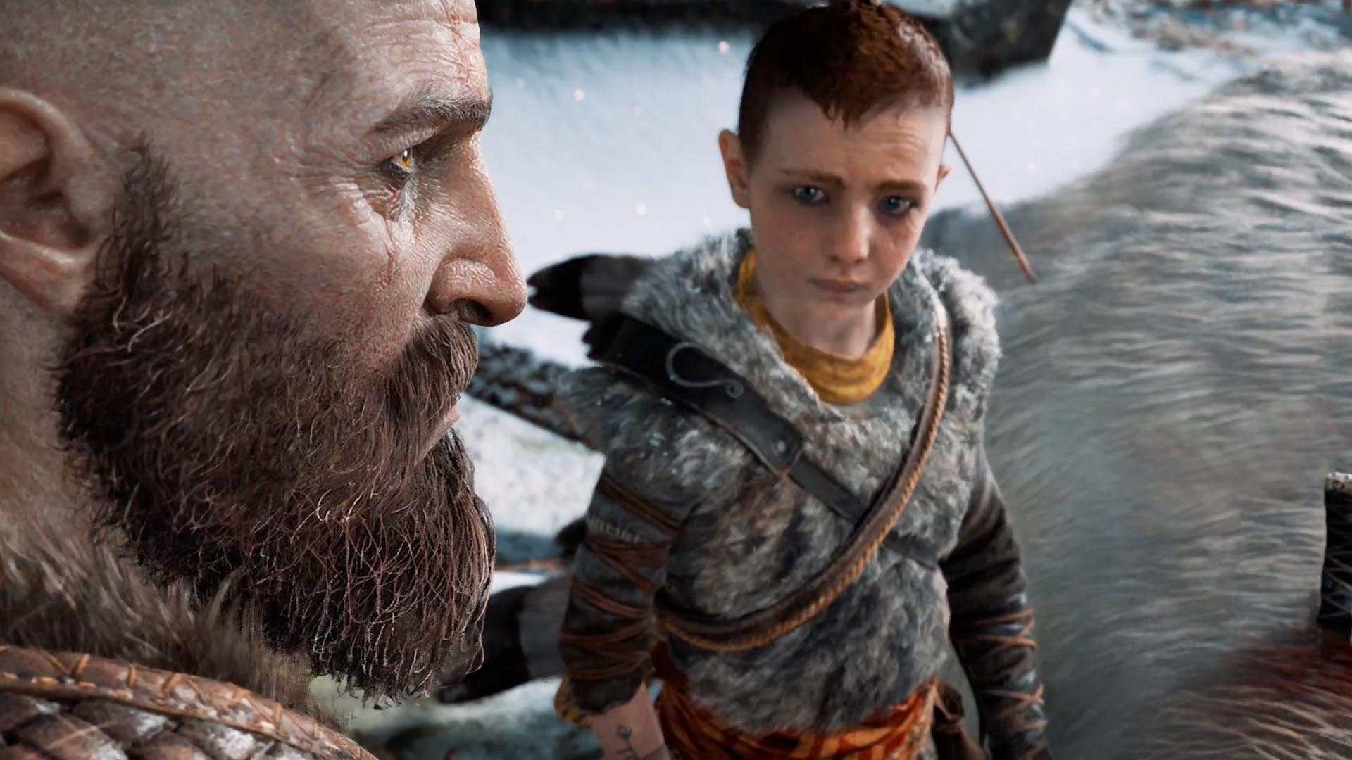 God of War - Kratos looks into the distance as Atreus looks up at him