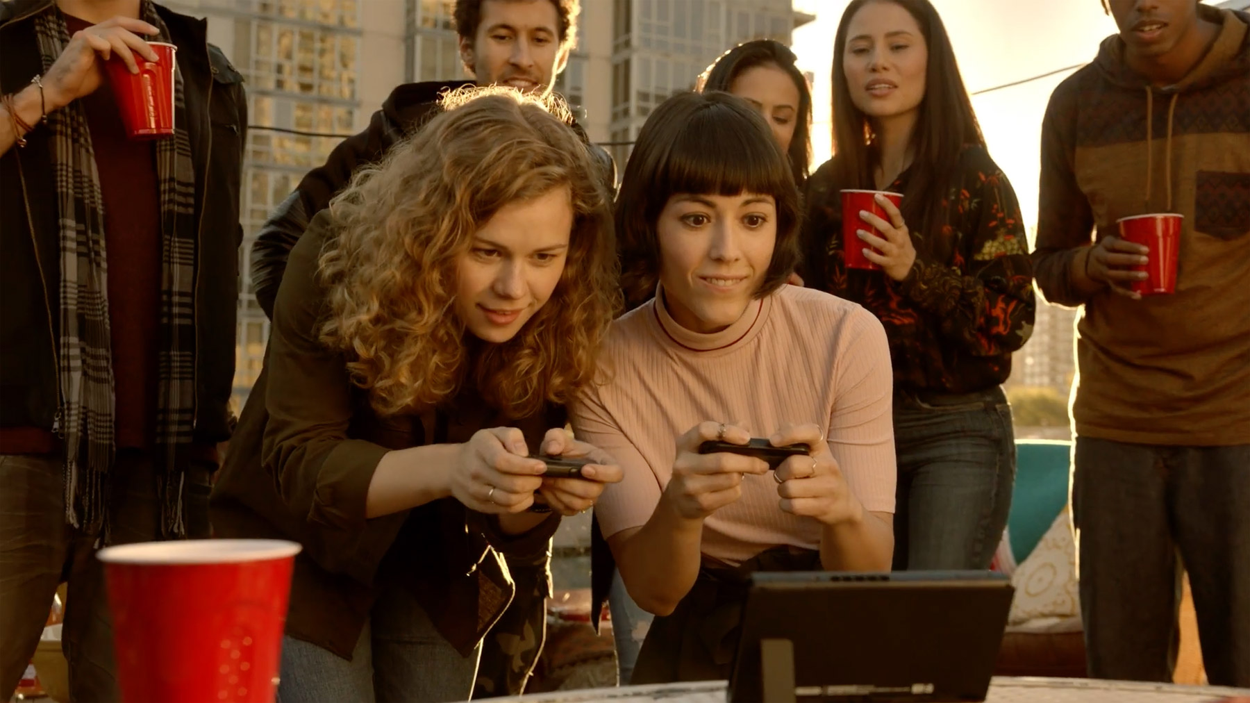 Nintendo Switch - ‘Karen’ playing switch on rooftop