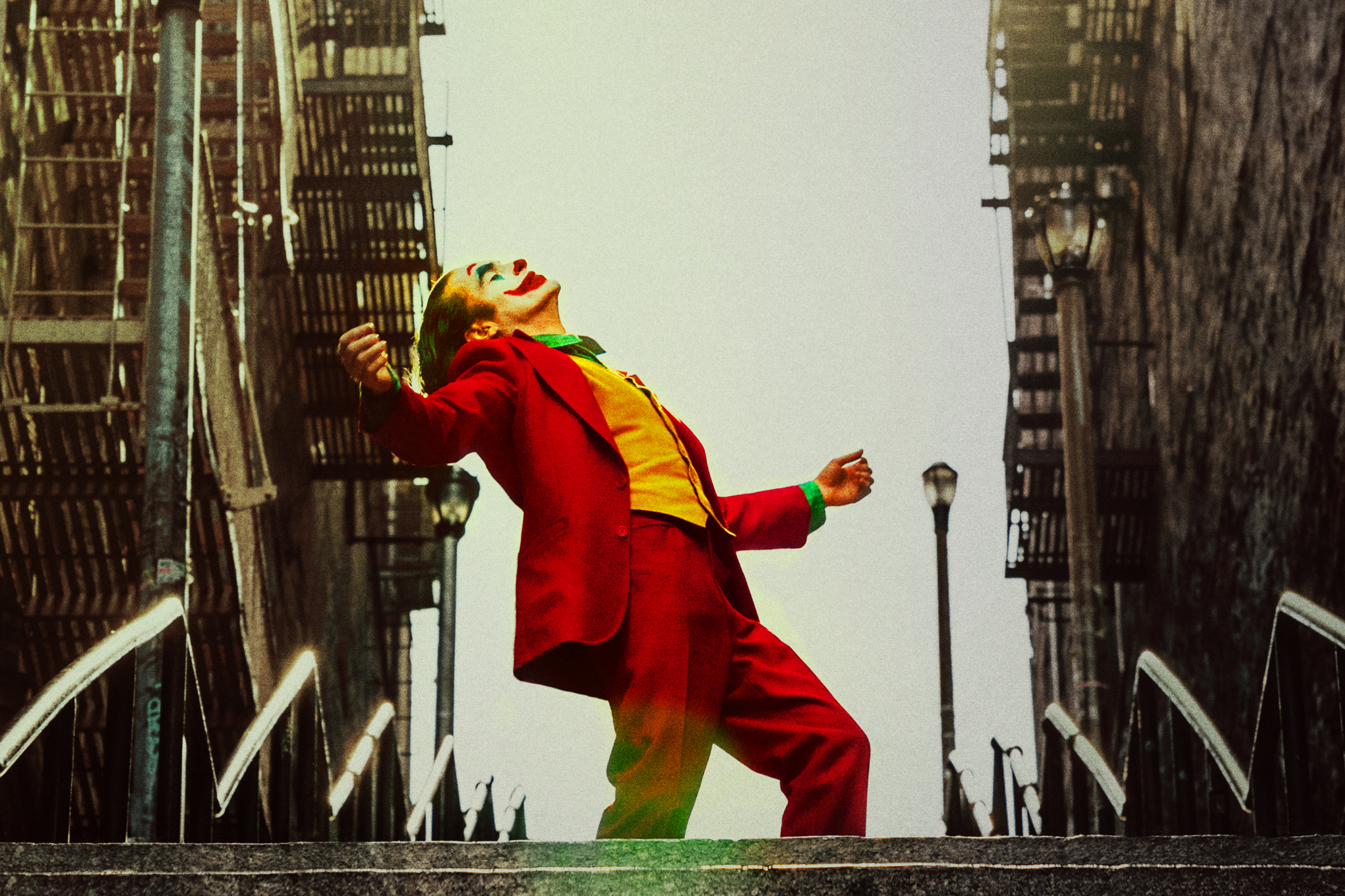 Joaquin Phoenix as the Joker looks to the sky