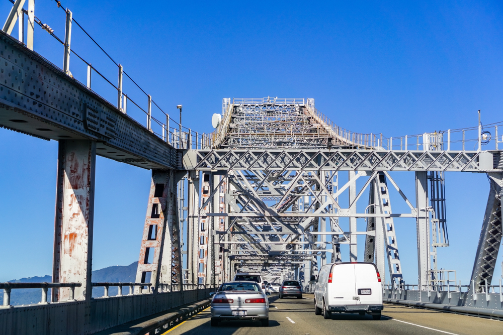 A photo of cars approaching the Richmond-San Rafael bridge.