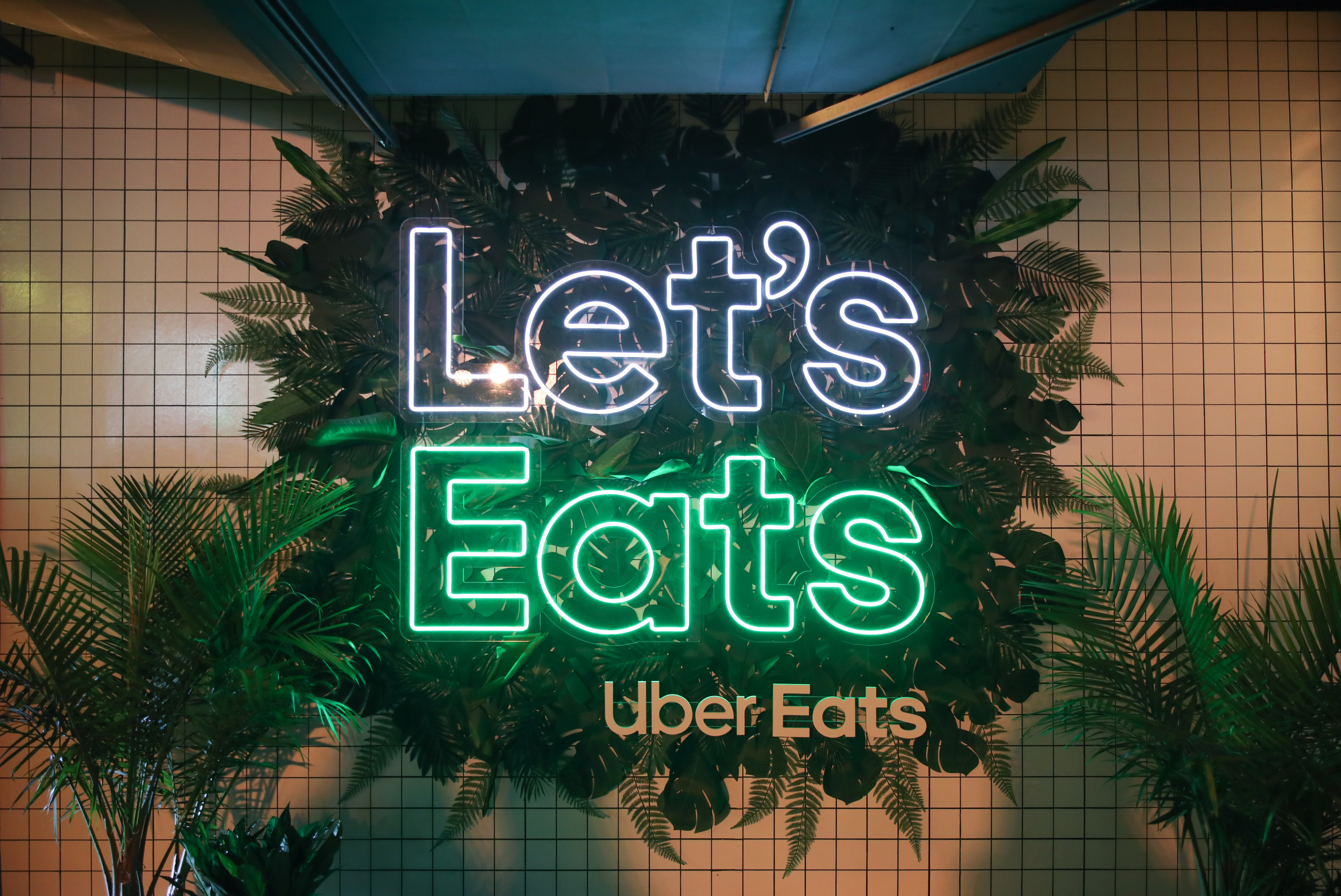 Uber Eats house during SXSW on March 14, 2019 in Austin, Texas. The neon sign reads, “Let’s Eats Uber Eats.”