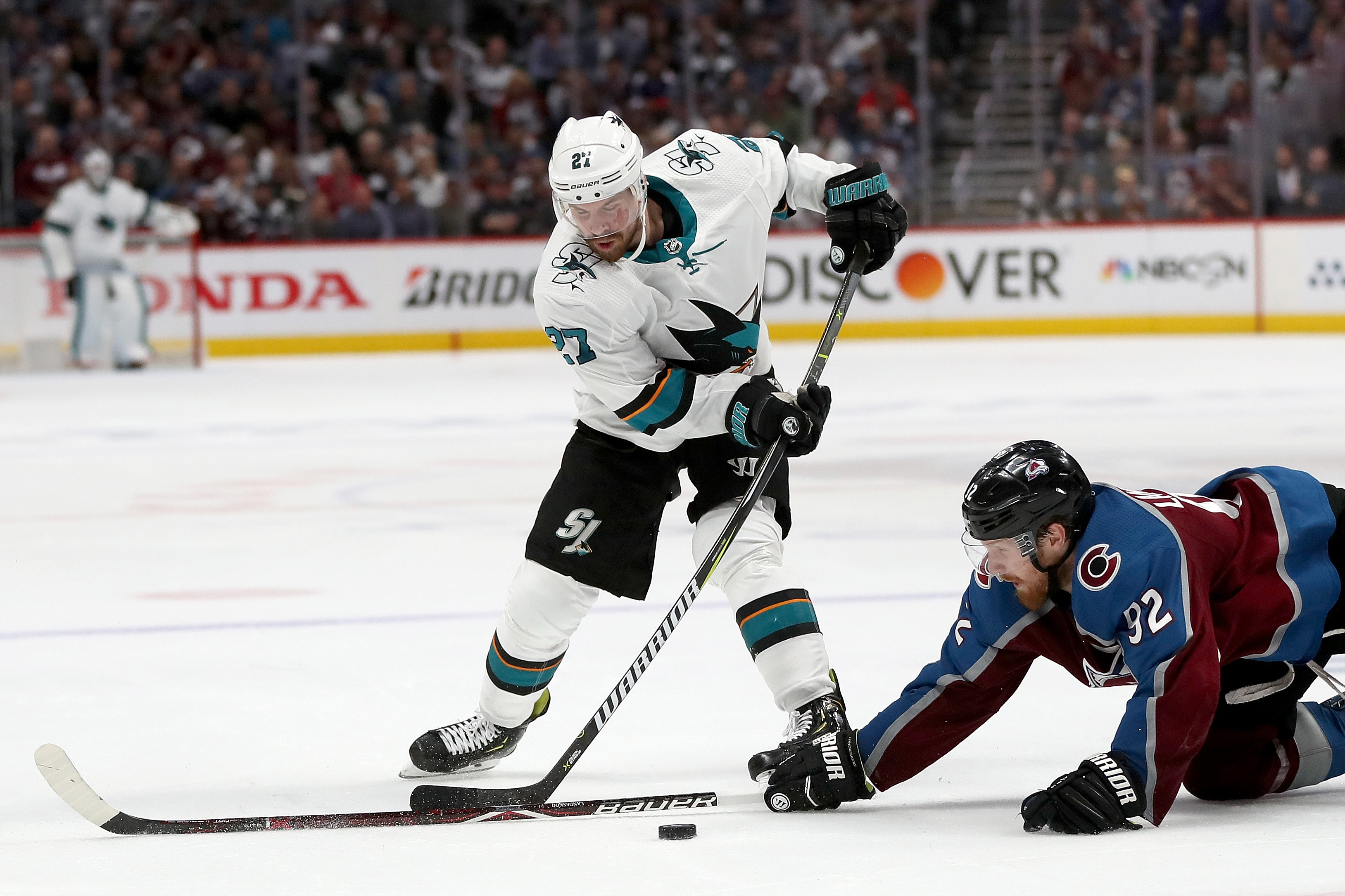 Joonas Donskoi of the San Jose Sharks attempts to get past Gabriel Landeskog of the Colorado Avalanche in the third period during Game 6 of the Western Conference Second Round during the 2019 NHL Stanley Cup Playoffs at the Pepsi Center on May 6, 2019 in 