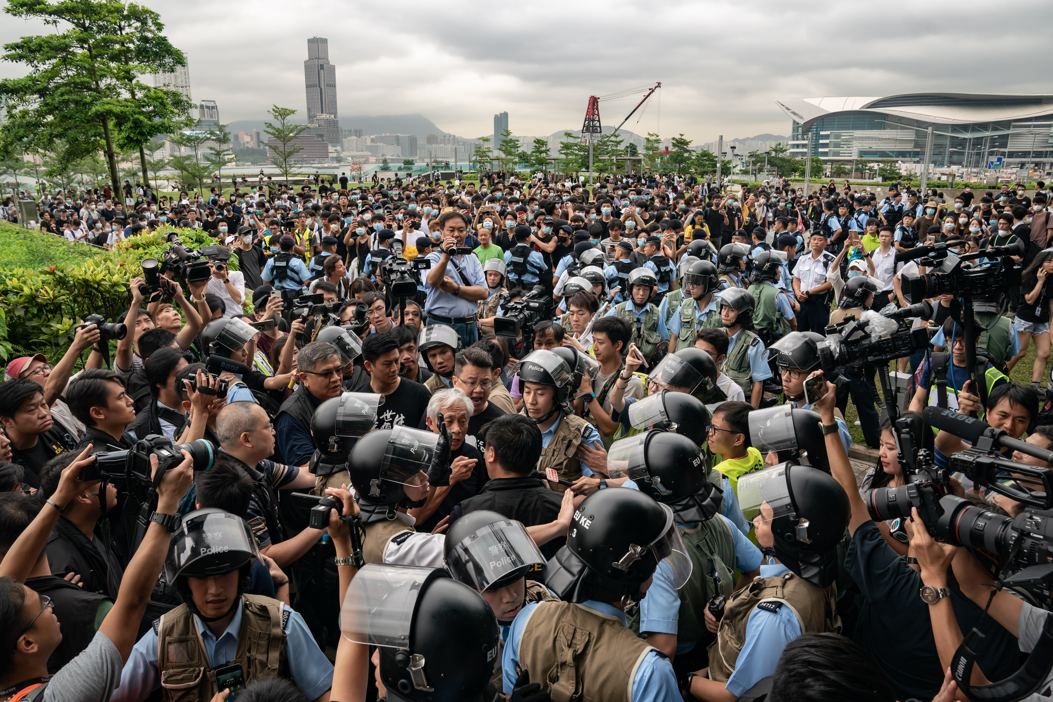 Protesters clash with police officers in Hong Kong.