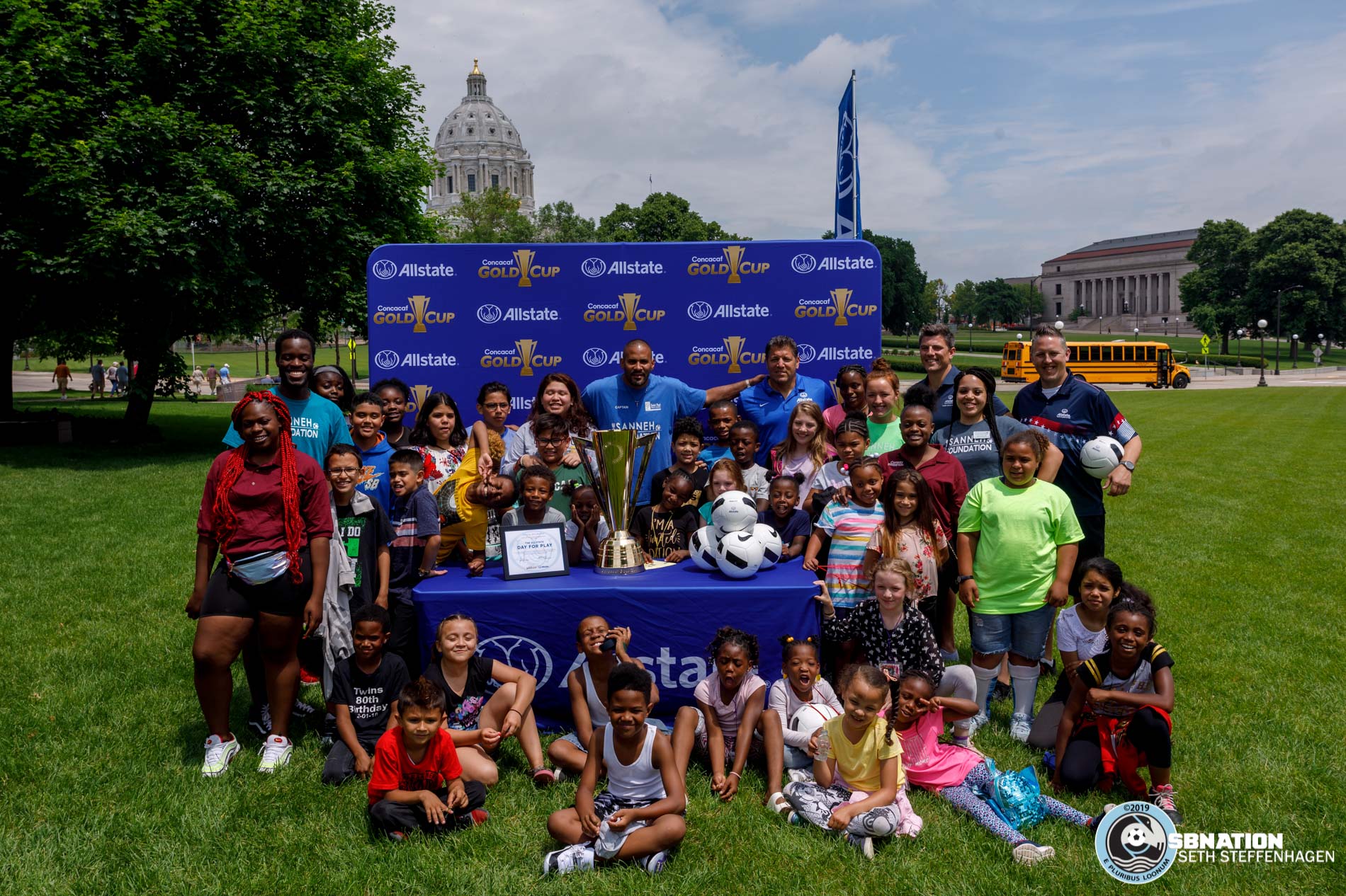 June 17, 2019 - Saint Paul, Minnesota, United States - Kids and staff from The Sanneh Foundation pose for a photo while at the Allstate Day For Play event on the lawn of the Minnesota State Capitol. 
