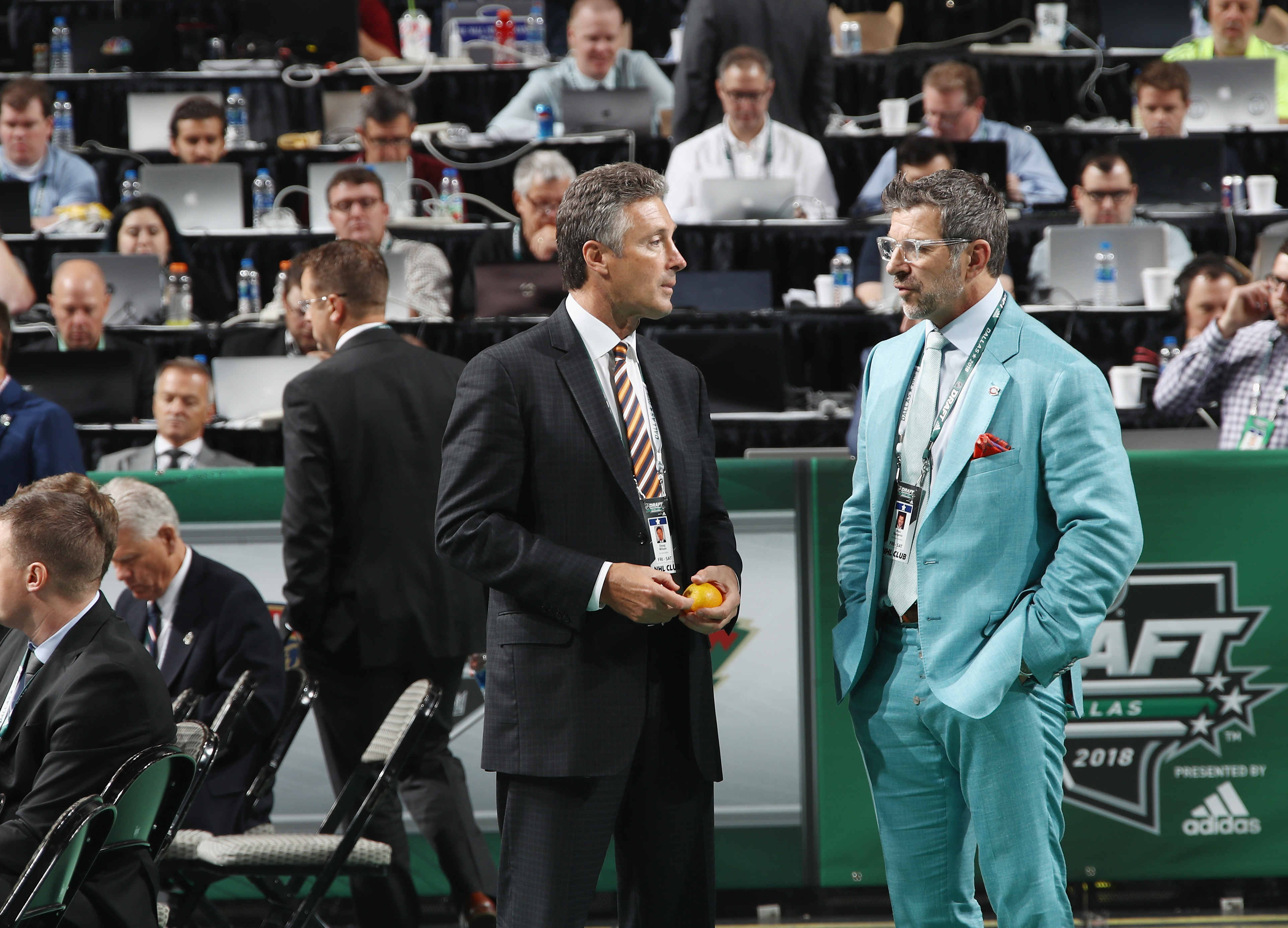 DALLAS, TX - JUNE 23: (l-r) Doug Wilson and Marc Bergevin attend the 2018 NHL Draft at American Airlines Center on June 23, 2018 in Dallas, Texas.