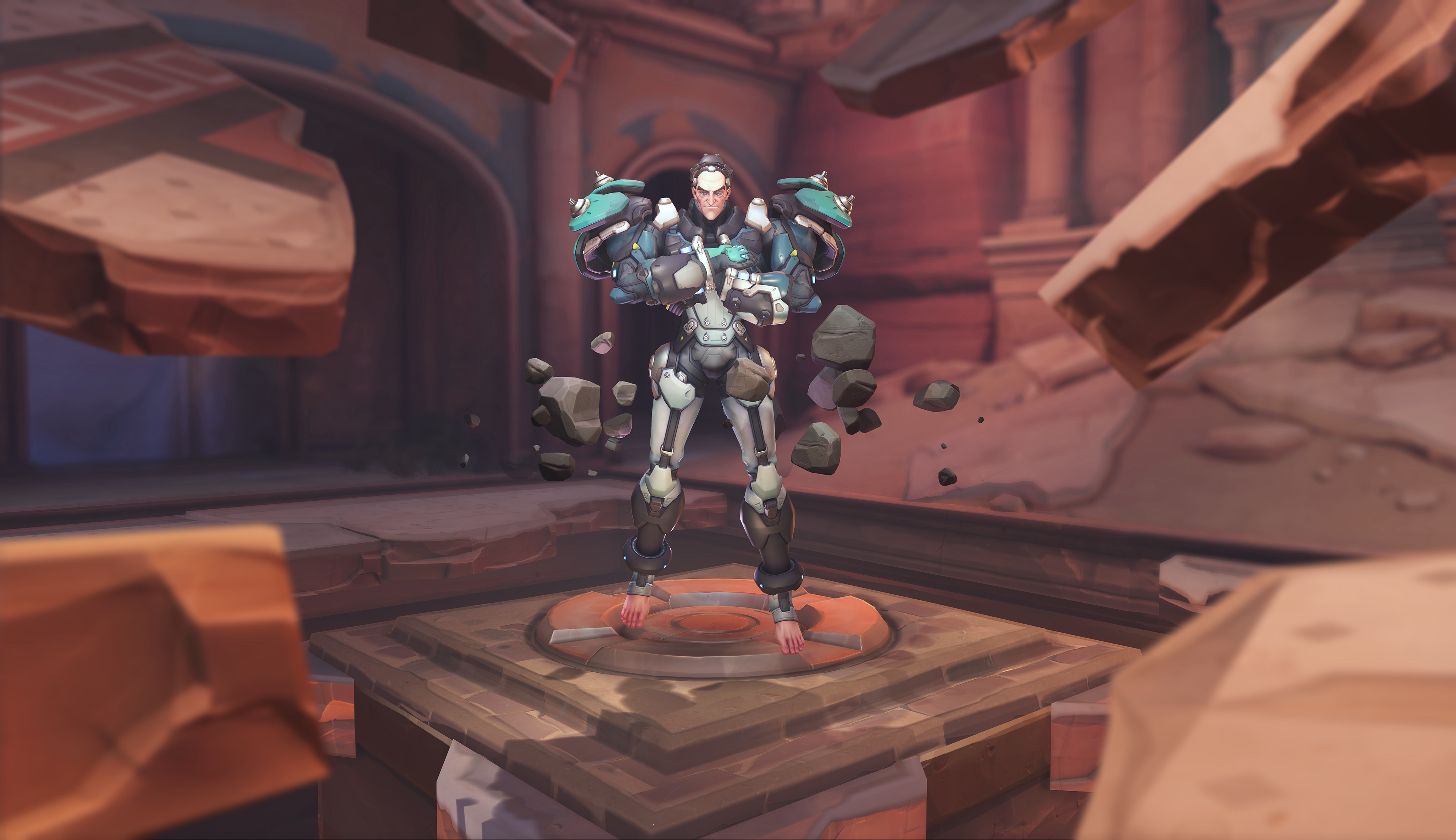 new hero Sigma floats in the desert map Petra in a screenshot from Overwatch