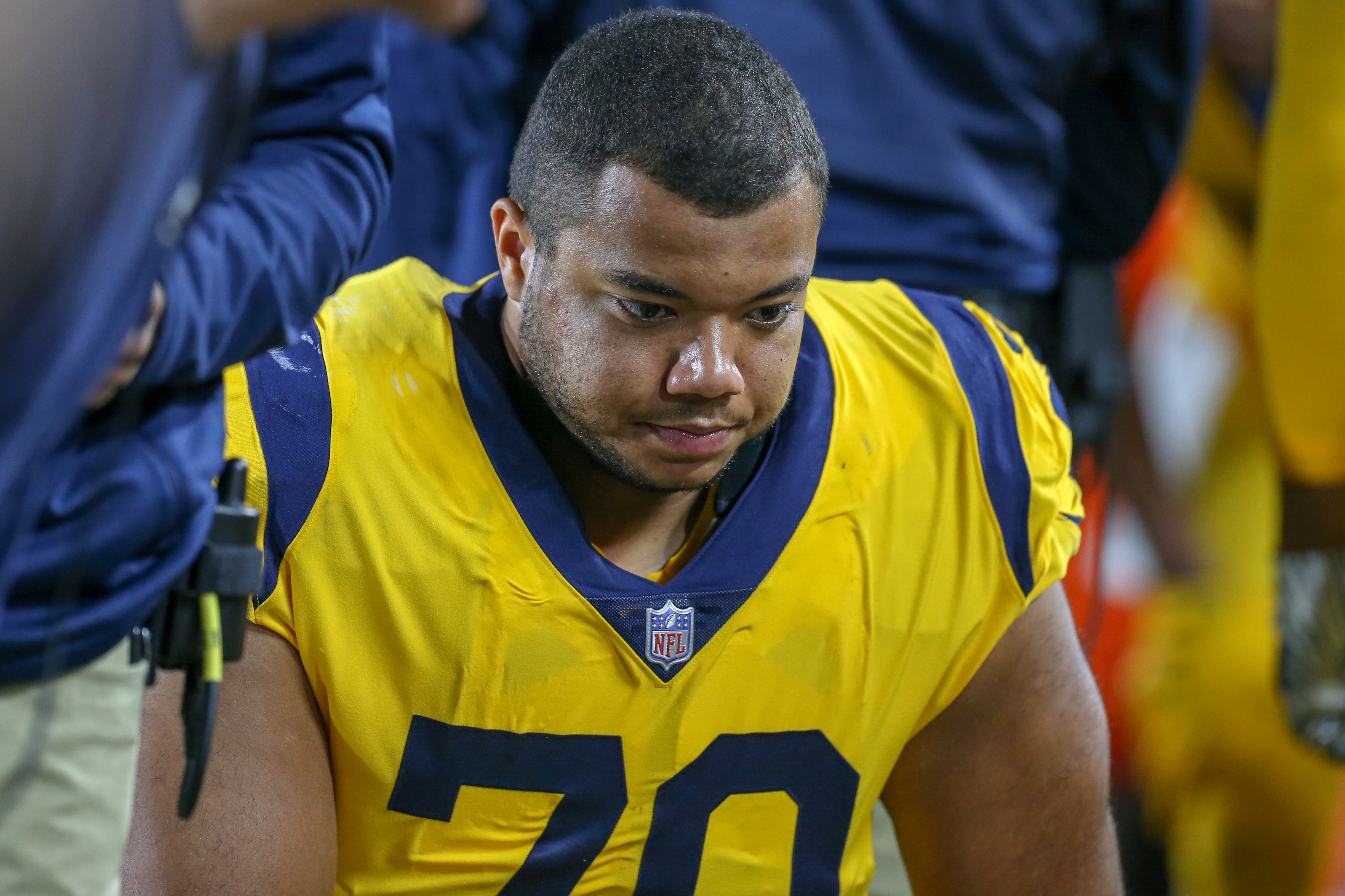 Los Angeles Rams OL Joe Noteboom rests on the sideline during the Week 11 game against the Kansas City Chiefs, Nov. 19, 2018.