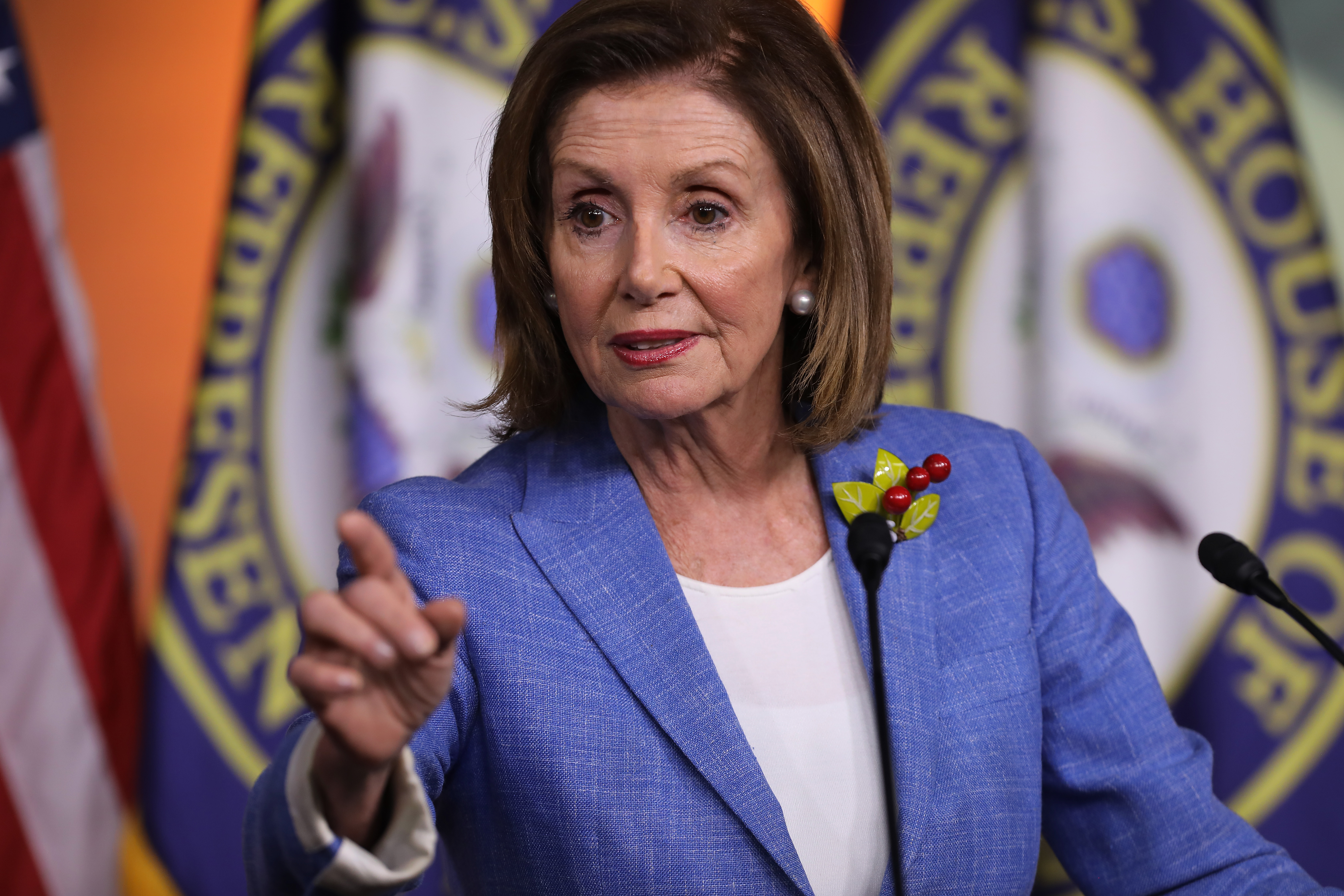 Nancy Pelosi, the speaker of the House, points during a press conference at the Capitol.