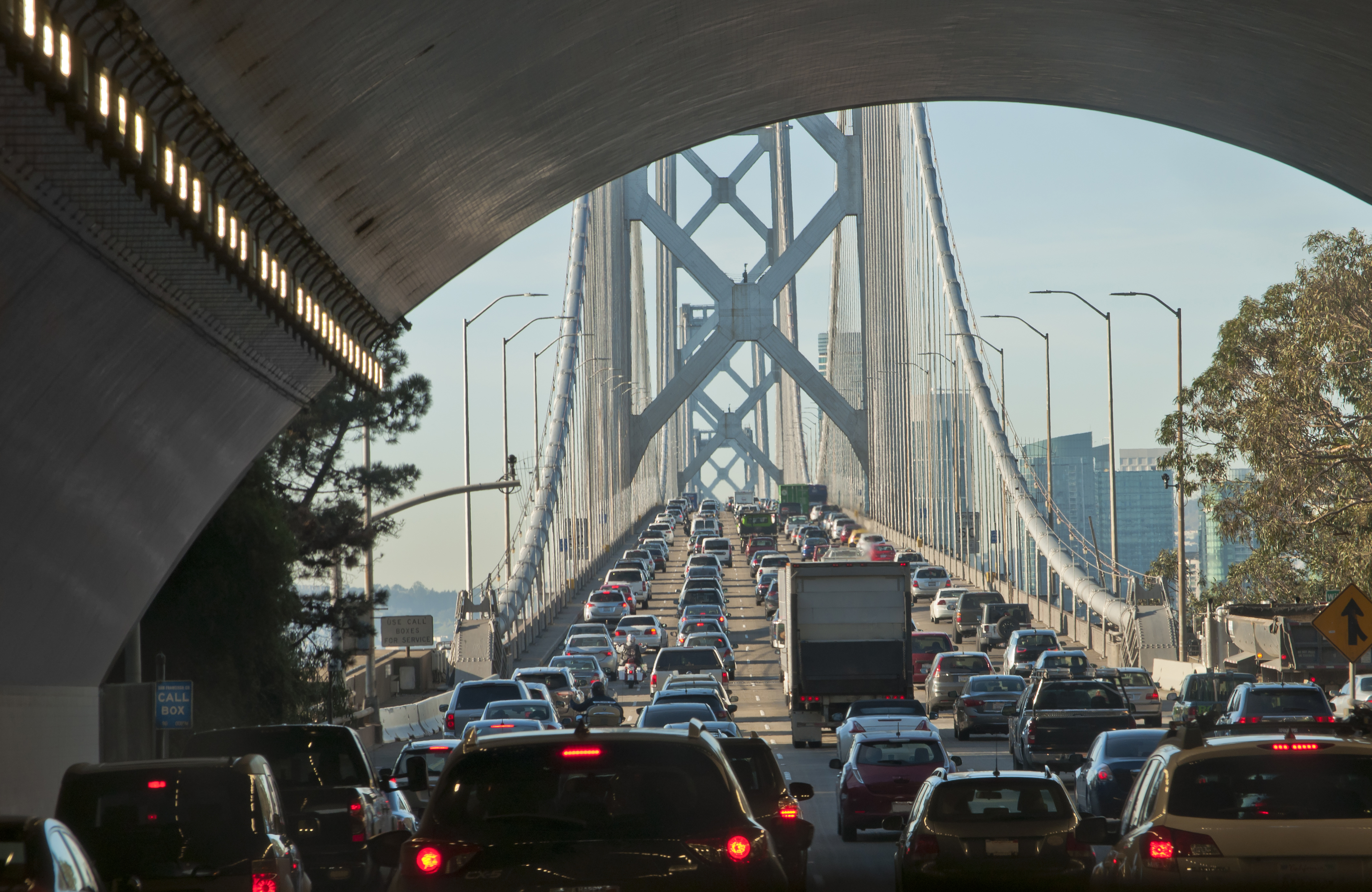 Massive traffic jam In the early morning on the Bay Bridge, at the exit of a tunnel. It is the main connection between the cities of Oakland and San Francisco.