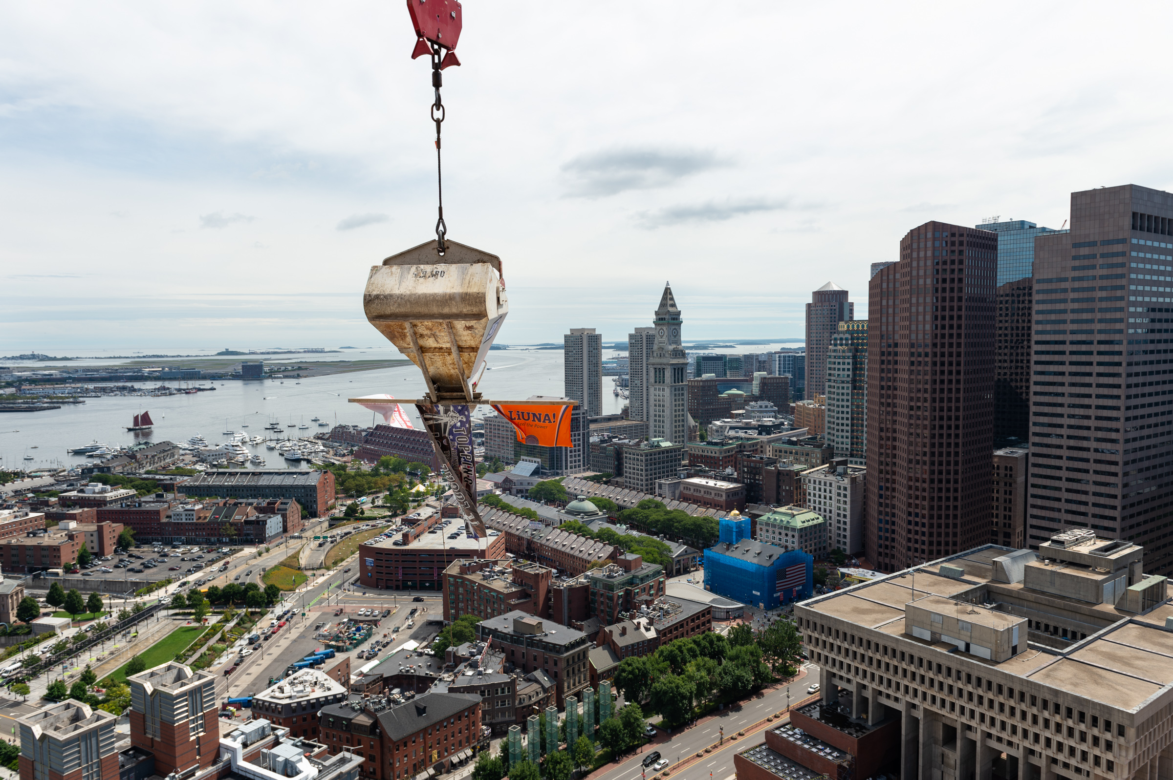 A crane suspended over Boston.
