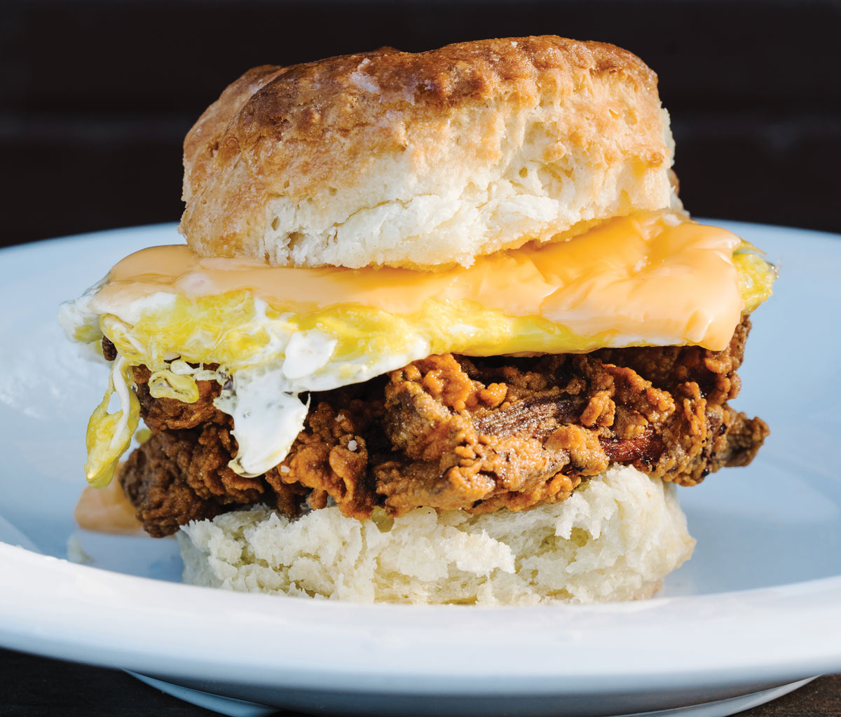 Fried chicken biscuit topped with egg and cheese from Bomb Biscuit in Atlanta