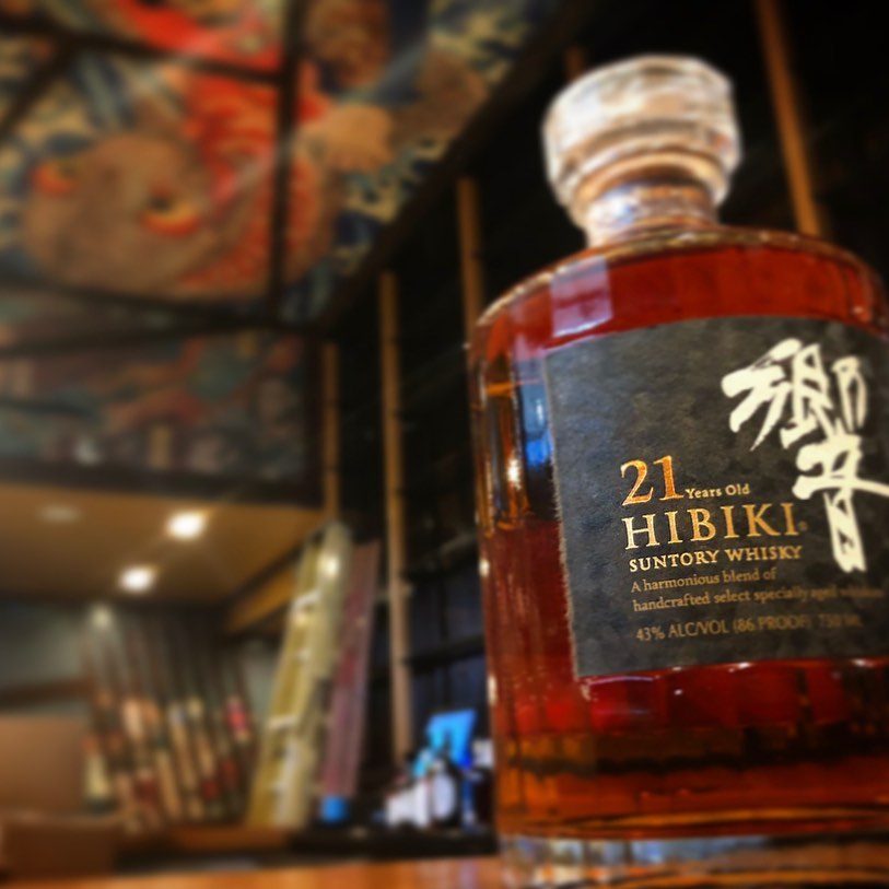 A bottle of Hibiki Japanese whiskey on the bar at Toukei
