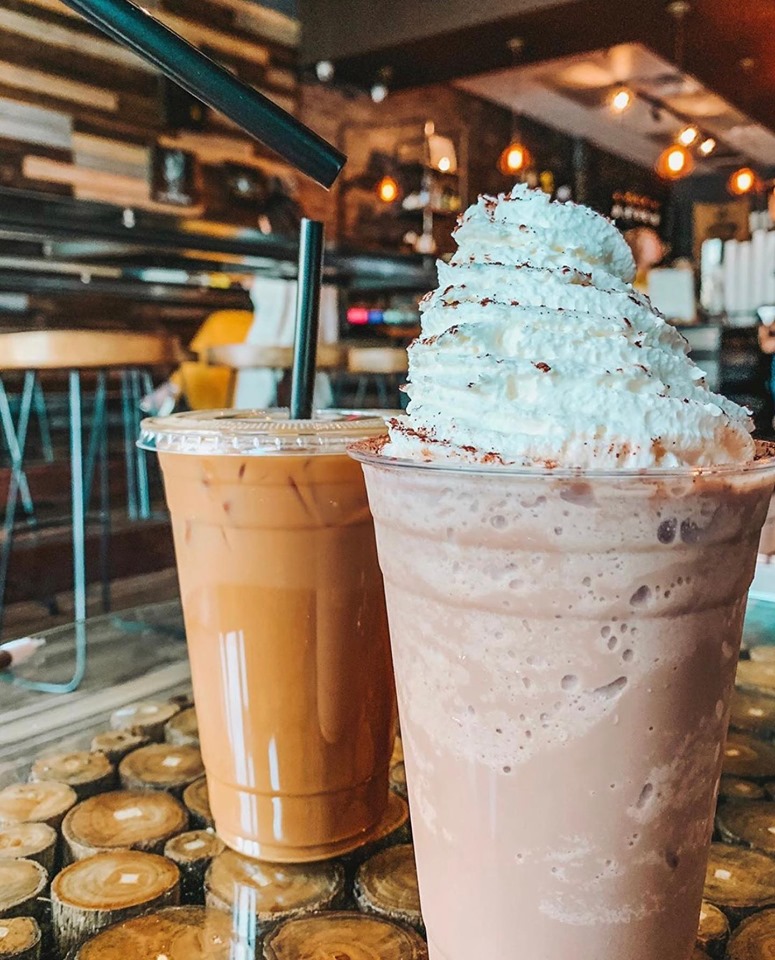 Iced and blended lattes topped with whipped cream at Bad Owl Coffee’s first location in Henderson.