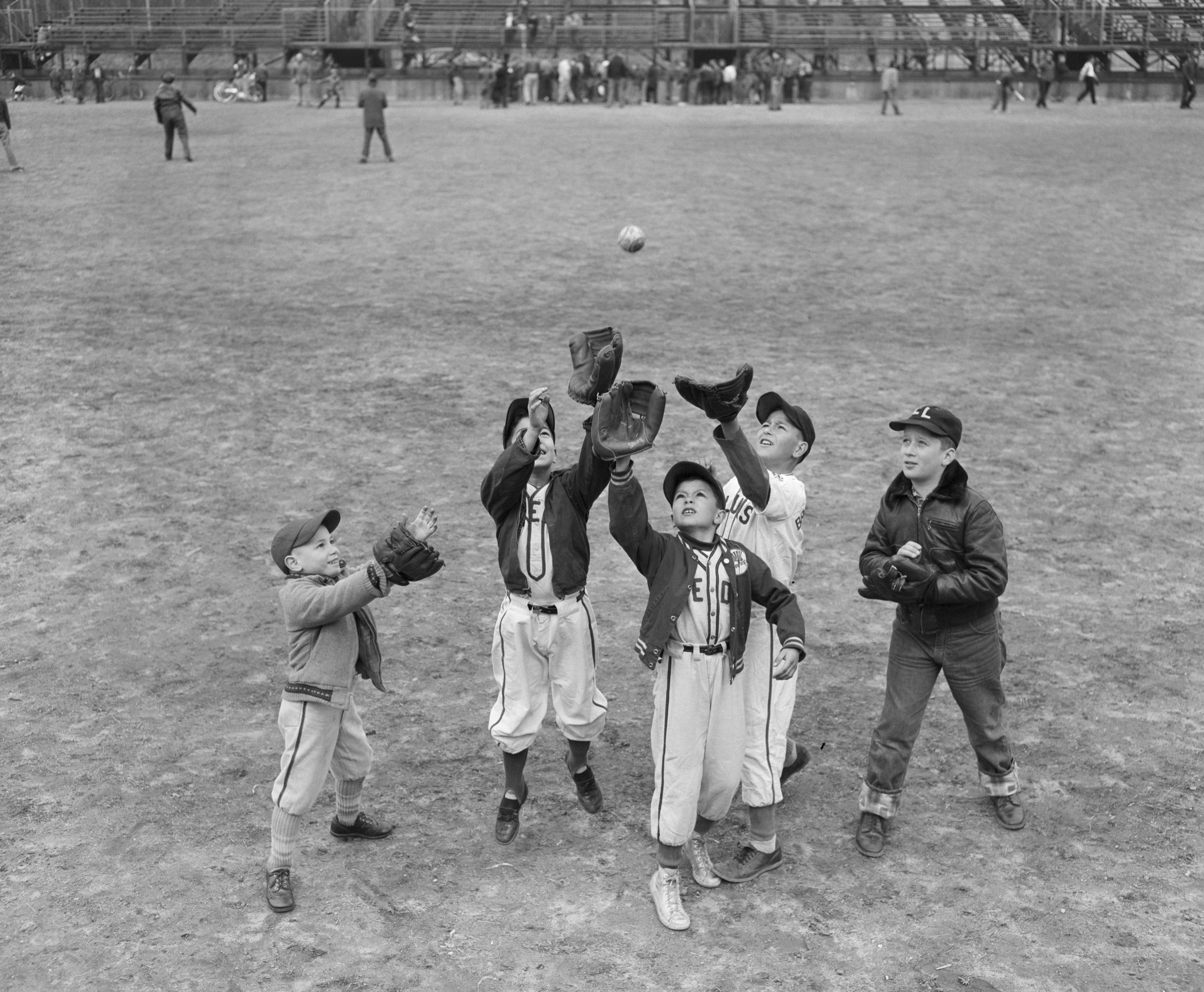 Boys Trying to Catch Softball