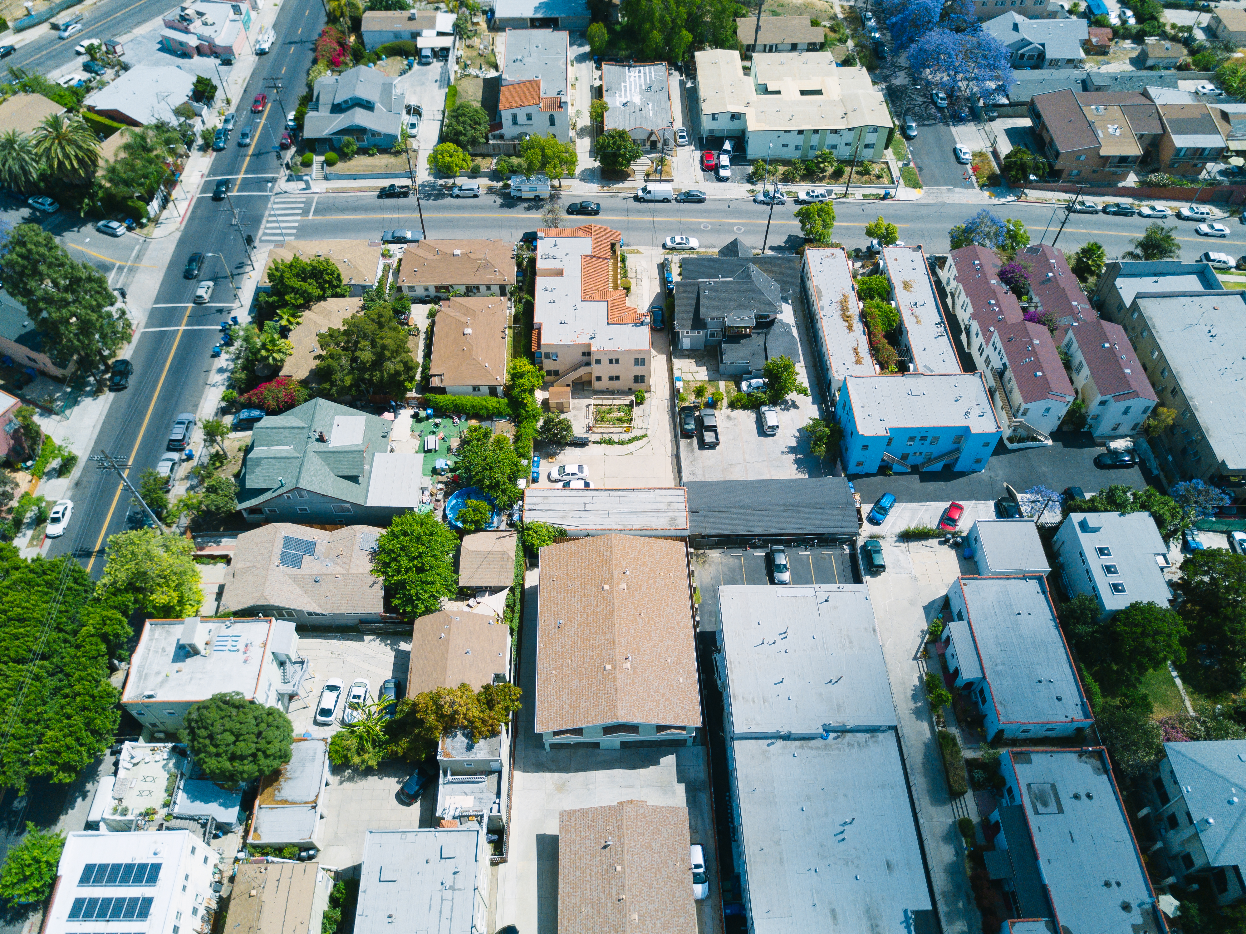 Aerial image of building rooftops in a residential neighborhood.
