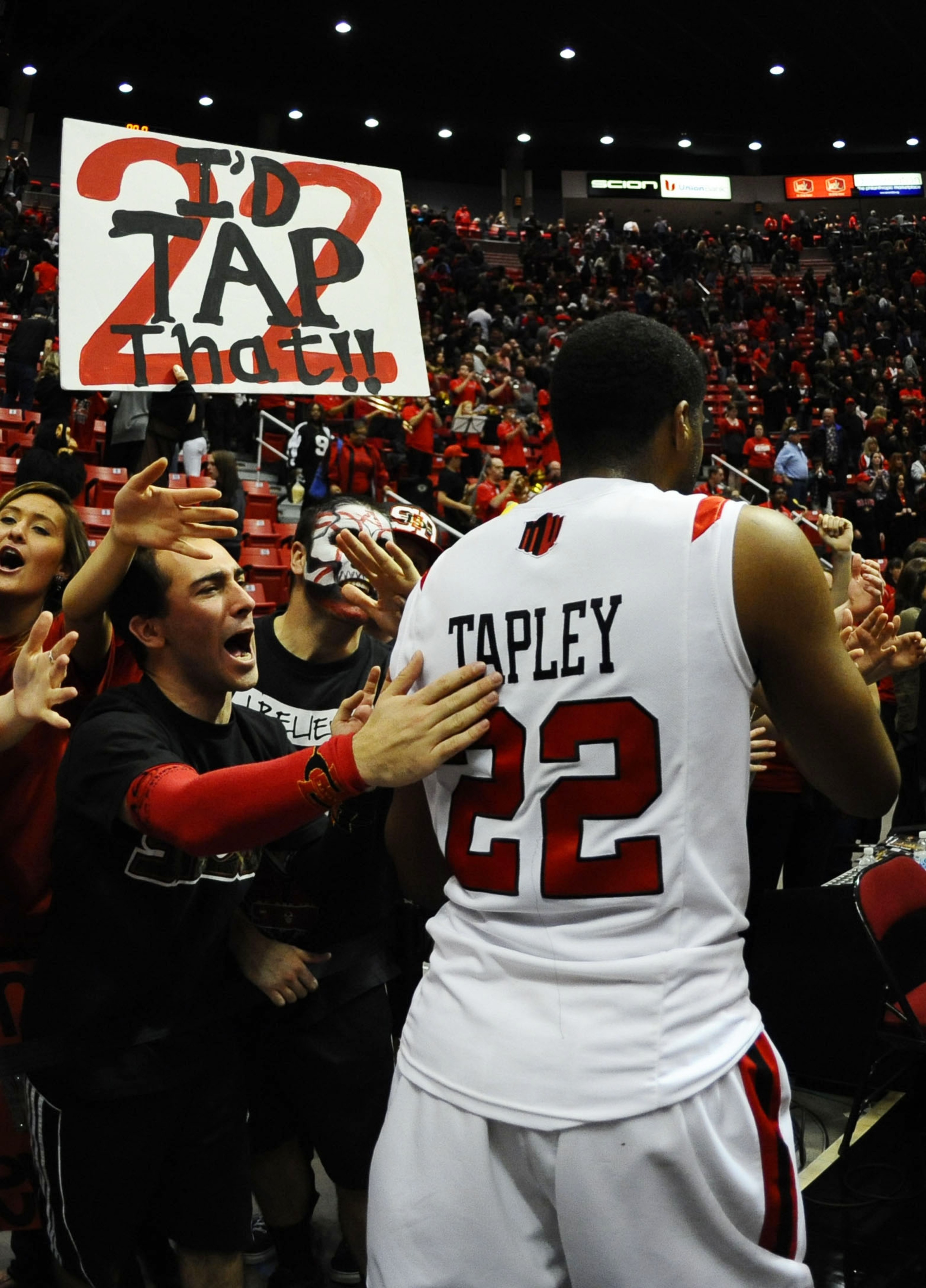 Fans love up SDSU's Chase Tapley after their win over CSU Saturday.