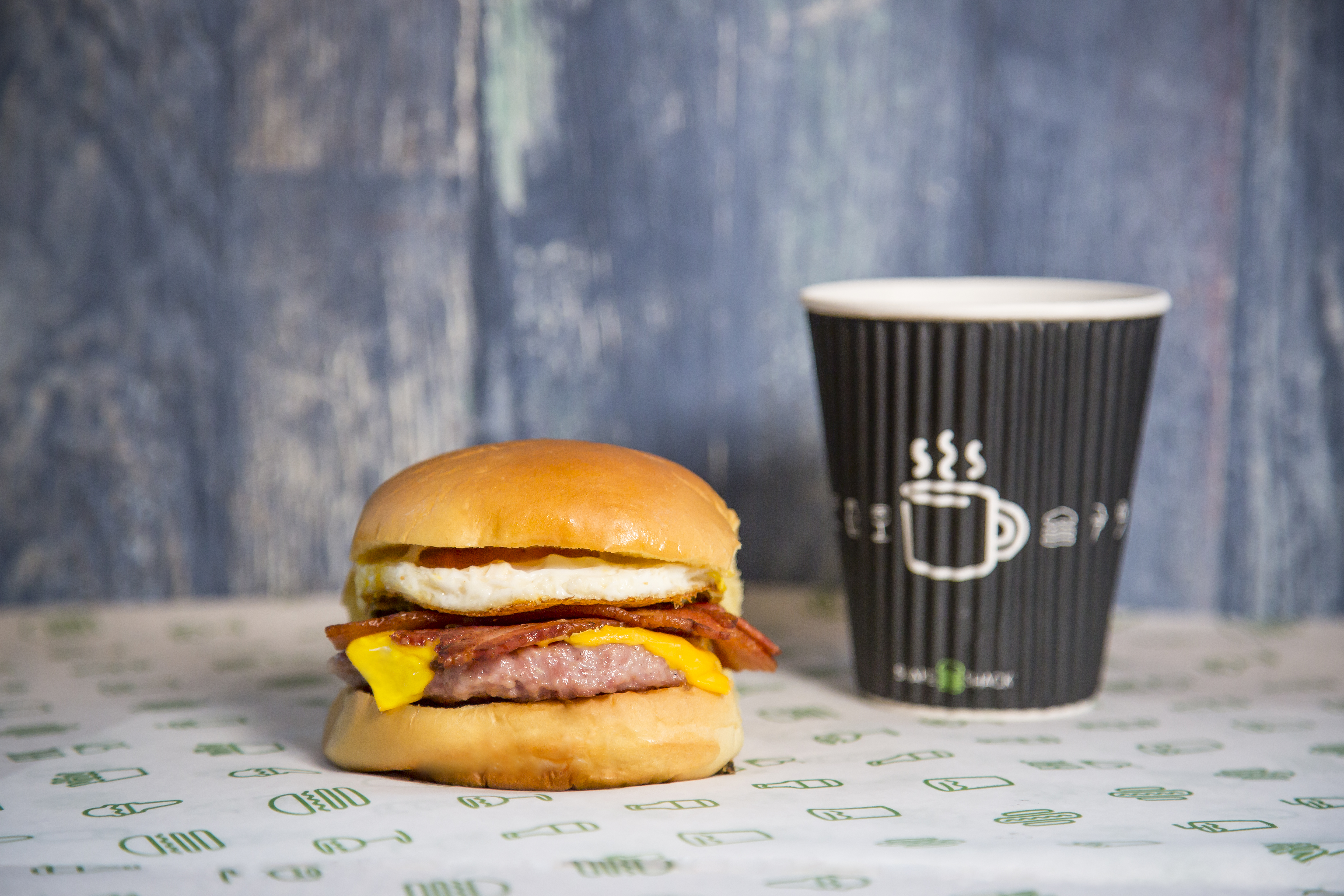 Shake Shack’s sausage, egg, bacon, and cheese breakfast sandwich is now available at Gatwick Airport 