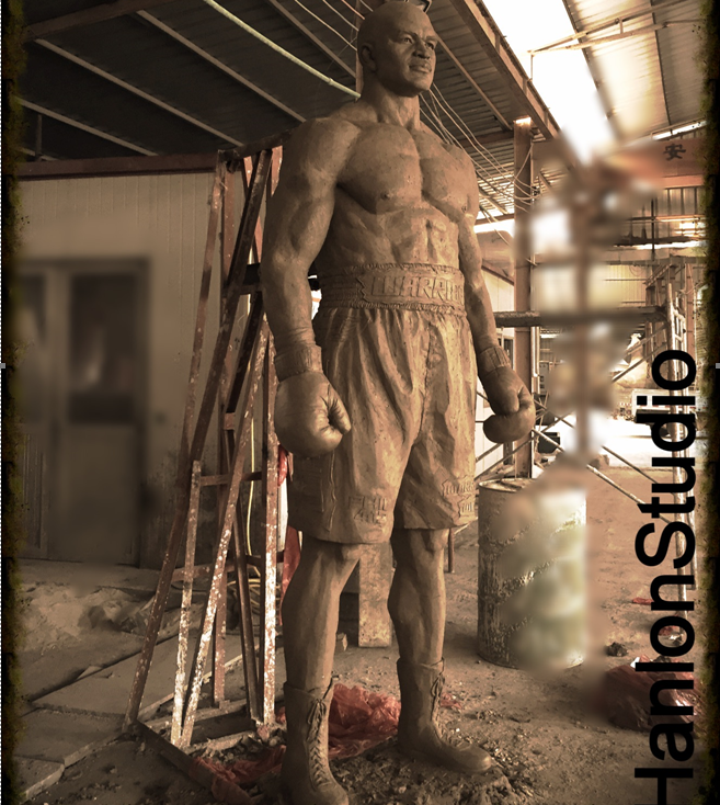 A photo of an Evander Holyfield statue before it was coated in bronze.