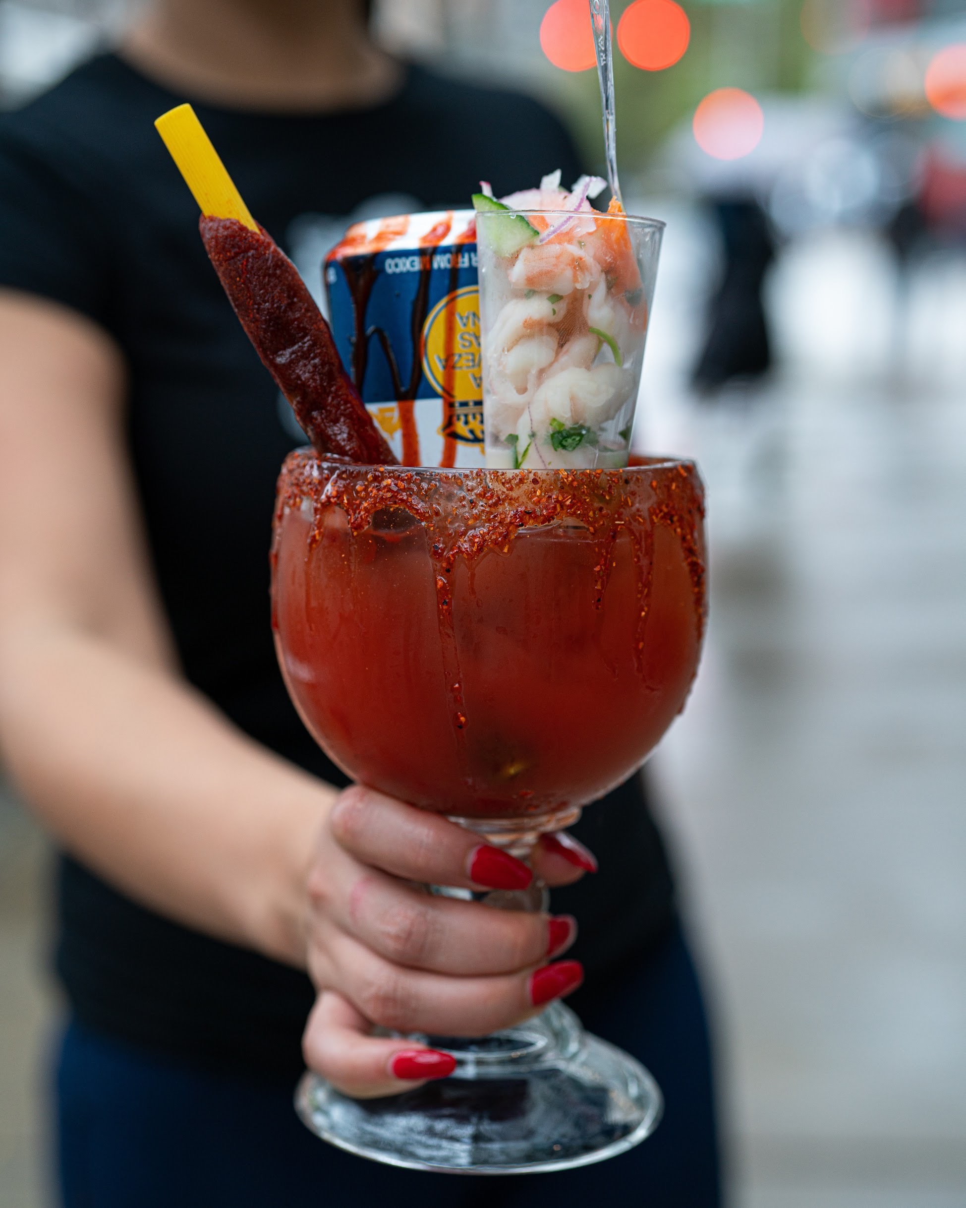 A michelada topped with a ceviche shot at Taco Rock