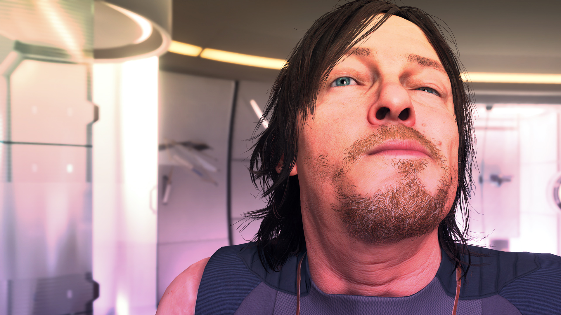 Death Stranding protagonist Sam makes a face in a mirror