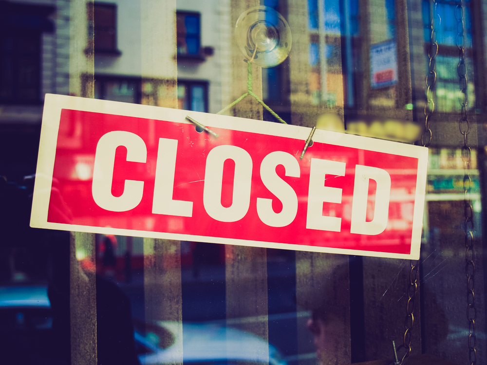 Stock photograph of a closed sign in a window