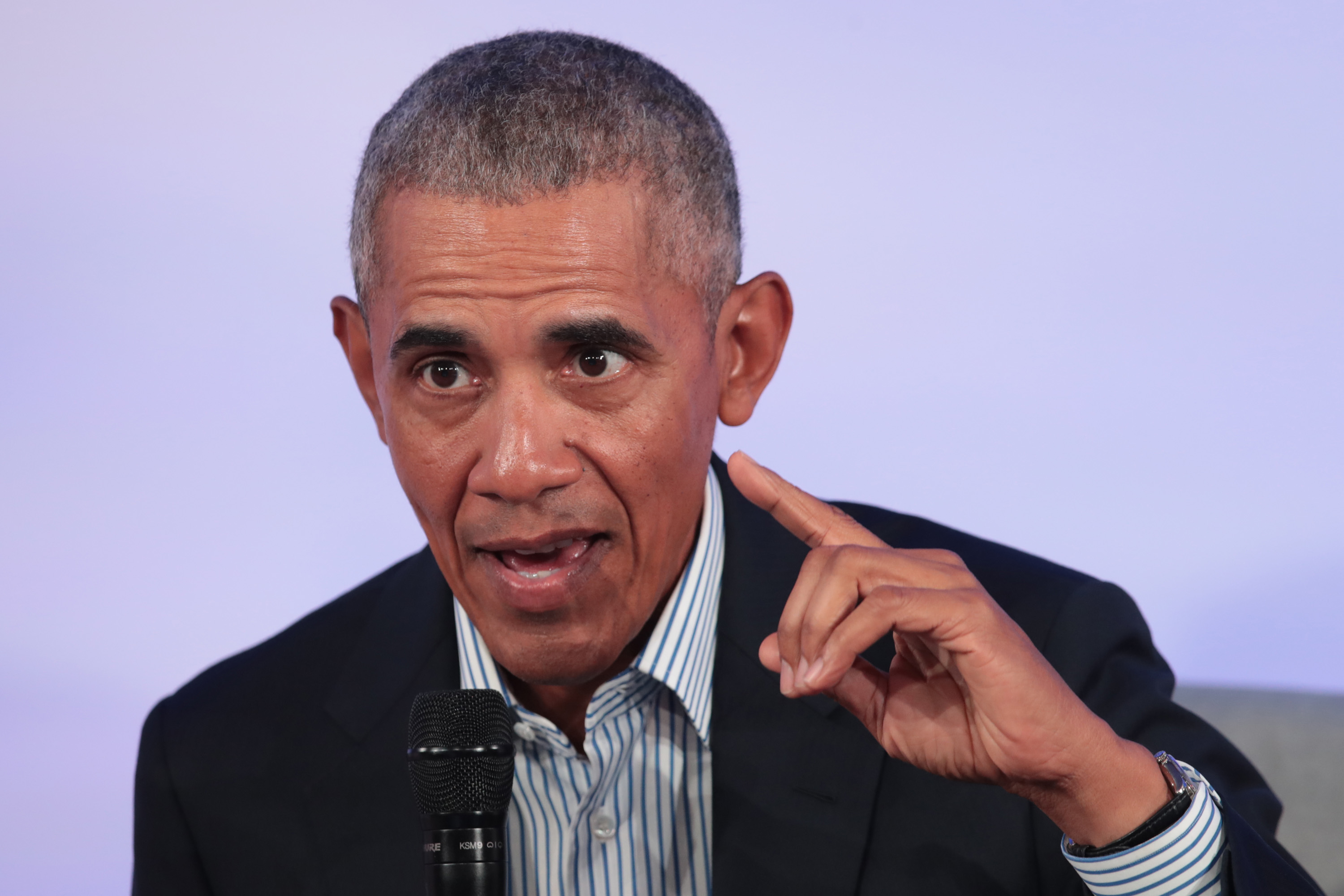 Barack Obama speaks at a lectern in October 2019.