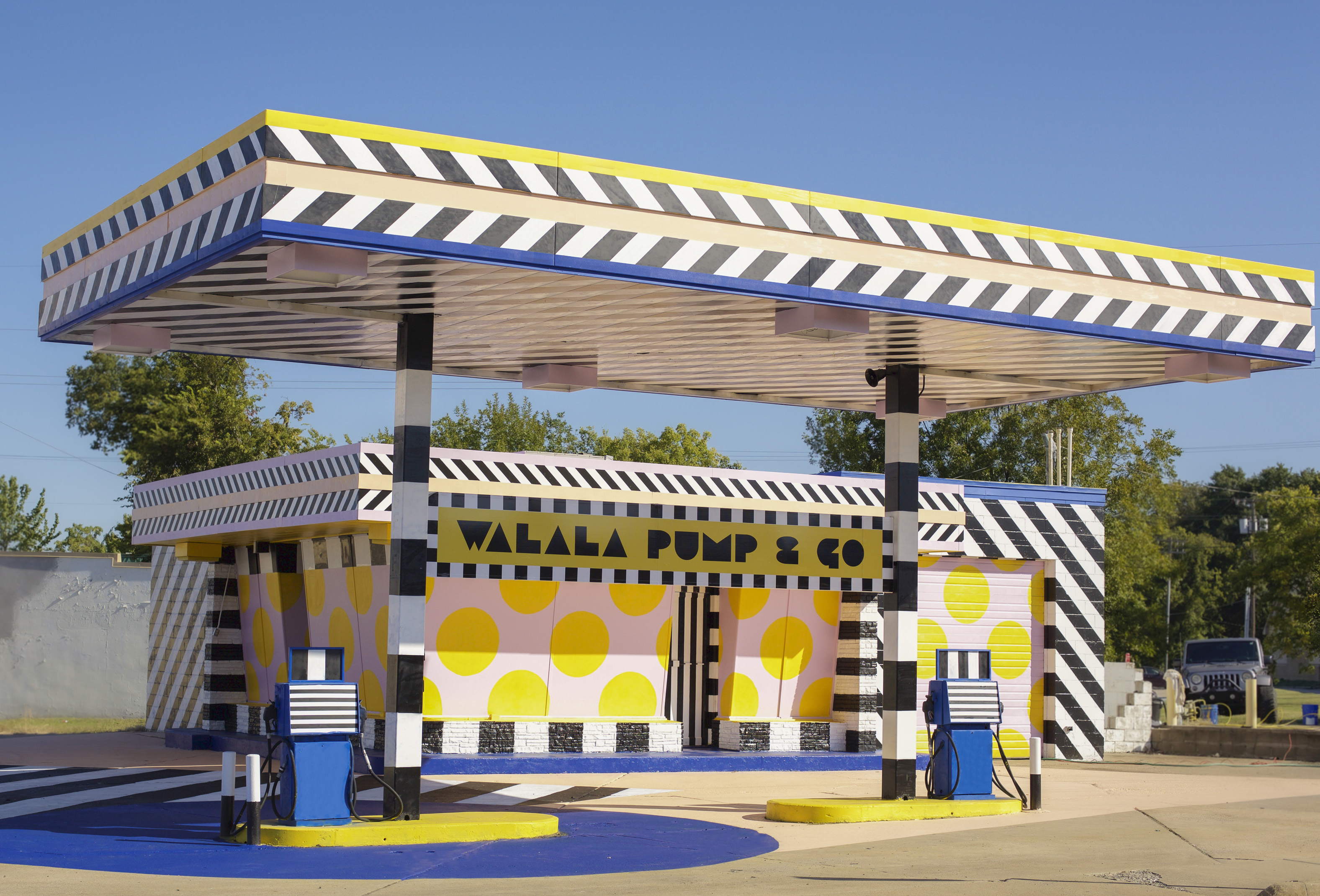 Gas station painted in colorful pattern
