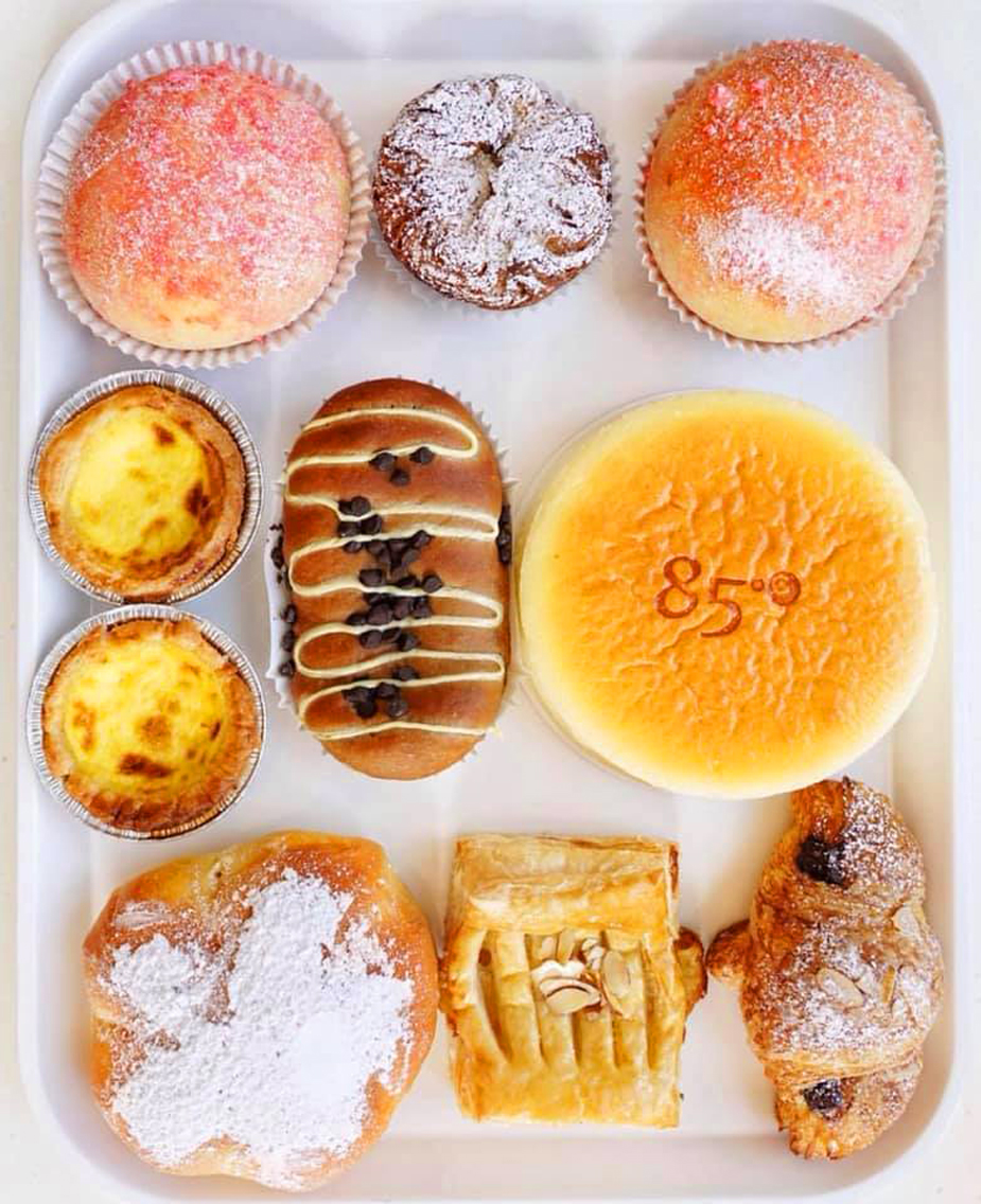 A selection of European and Asian-inspired pastries and cakes at 85C Bakery Cafe.