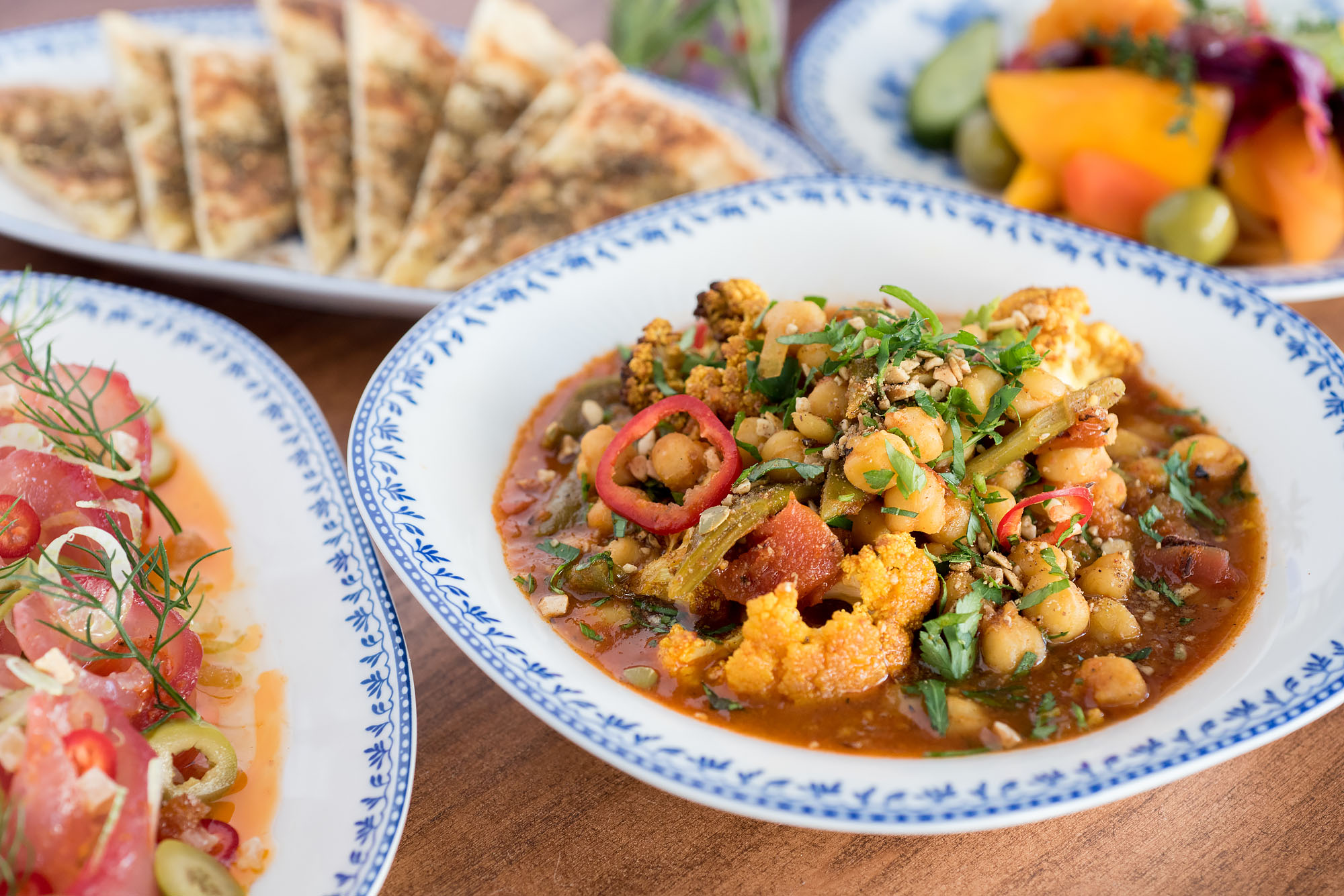 A spread of colorful Israeli food from Jaffa.