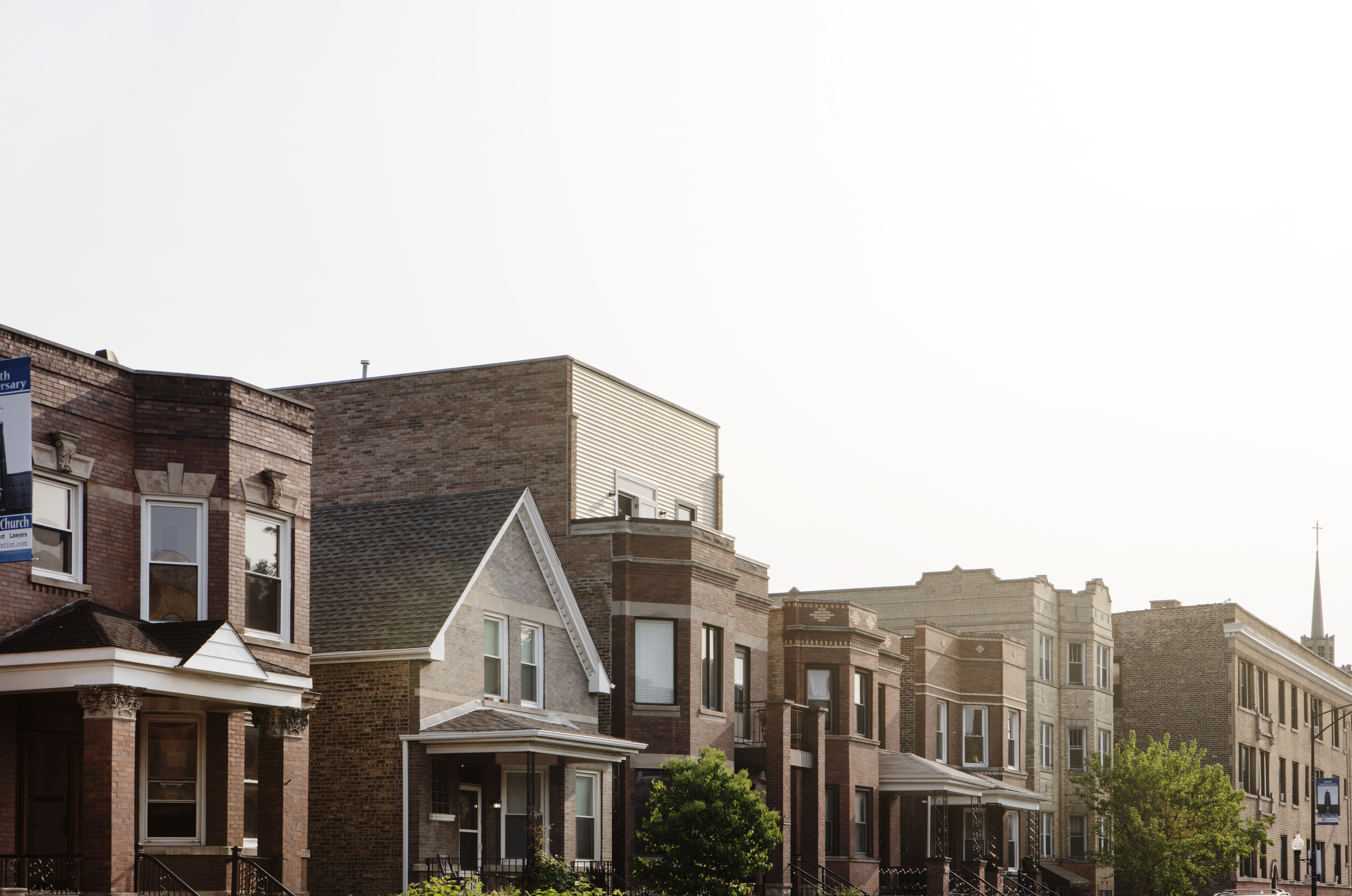 A row of homes on a Chicago neighborhood street.
