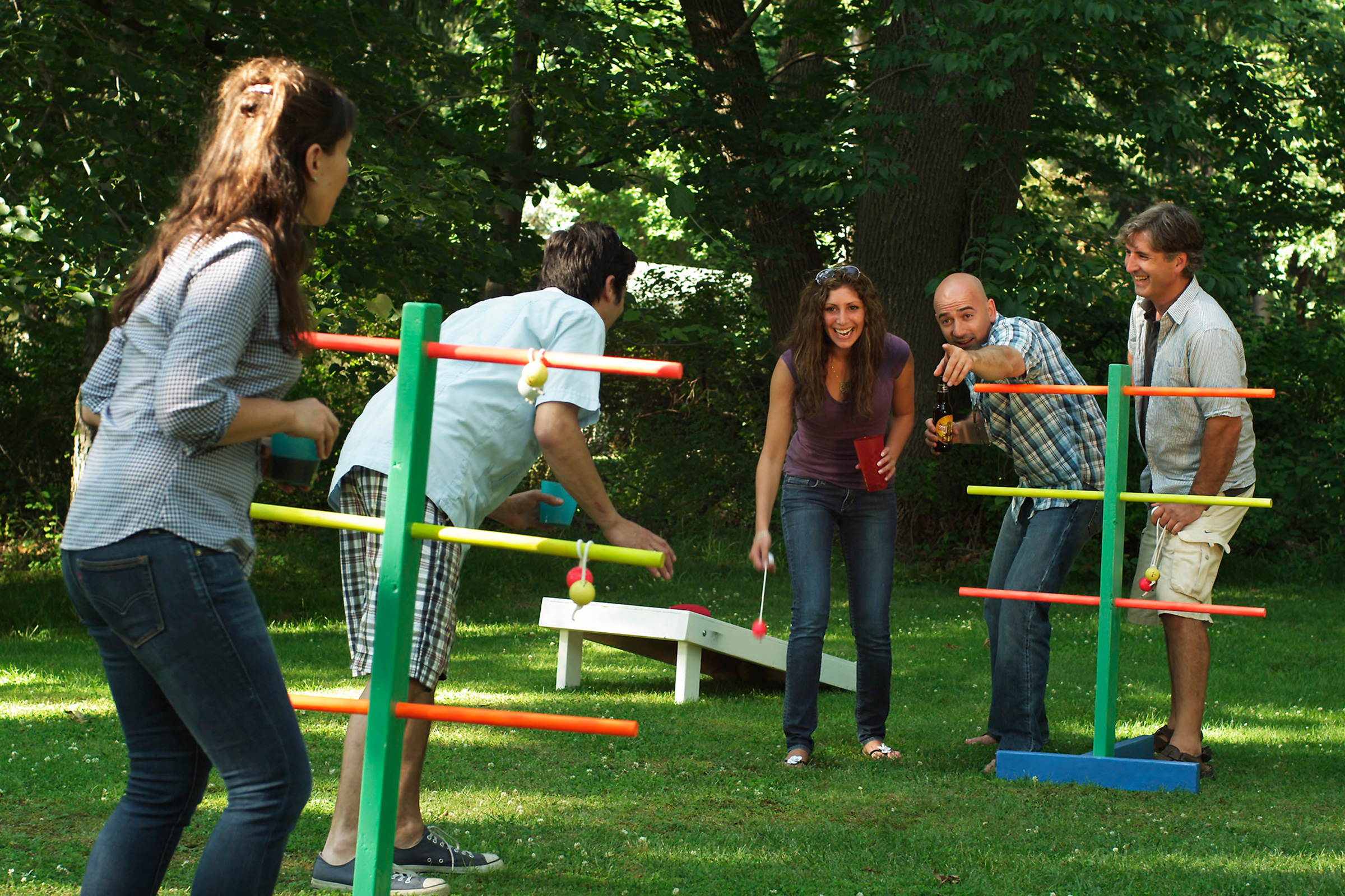 Couples play a game of ladder golf