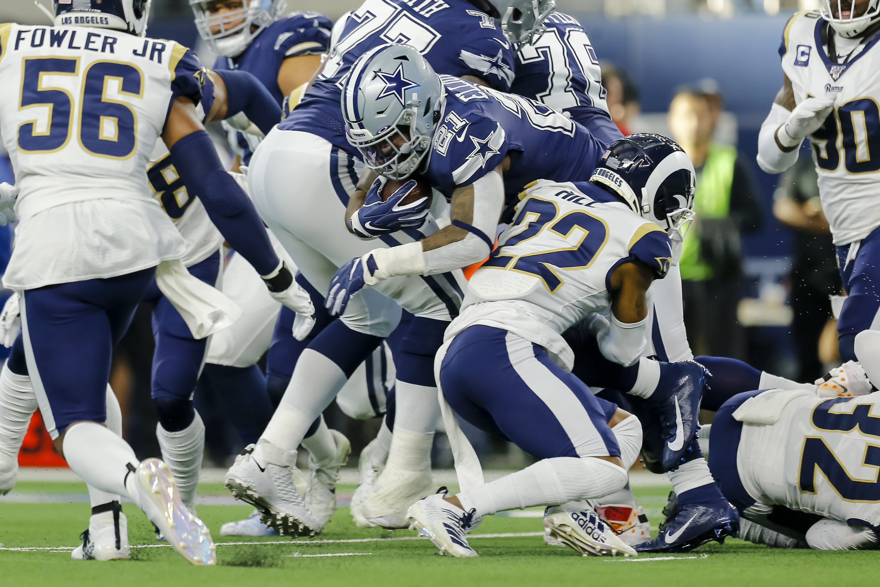 Los Angeles Rams CB Troy Hill tackles Dallas Cowboys RB Ezekiel Elliott&nbsp;in Week 15, Dec. 15, 2019.