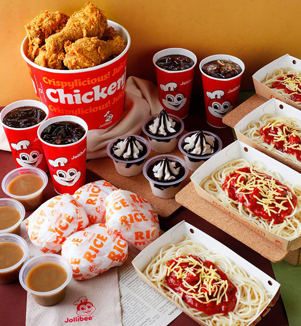 A Jollibee “Chickenjoy” bucket meal, including rice, sides, spaghetti and sundaes.
