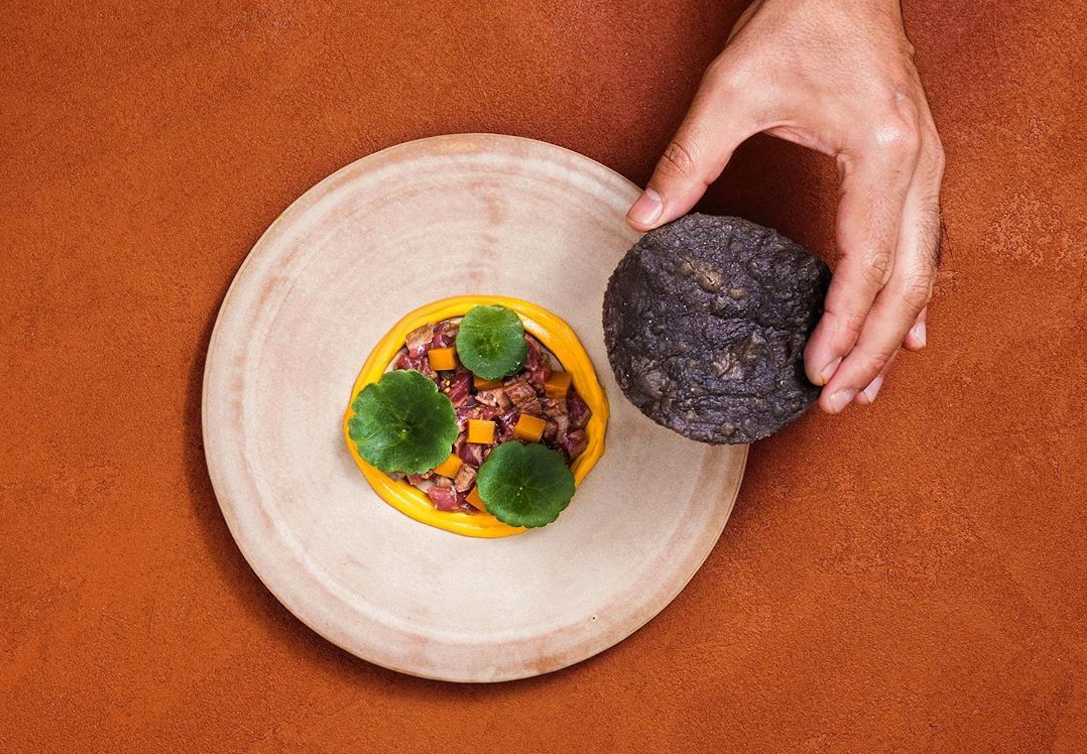 London’s biggest and best new restaurant openings of 2020 include Kol by Santiago Lastra, which serves Mexican dishes like this cured lamb leg tostada with fermented gooseberries and guajillo chilli