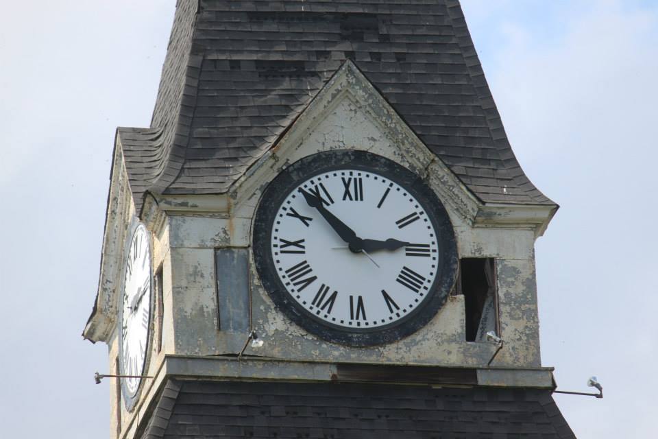 A close-up of the iconic clock tower atop Morris Brown’s Fountain Hall.