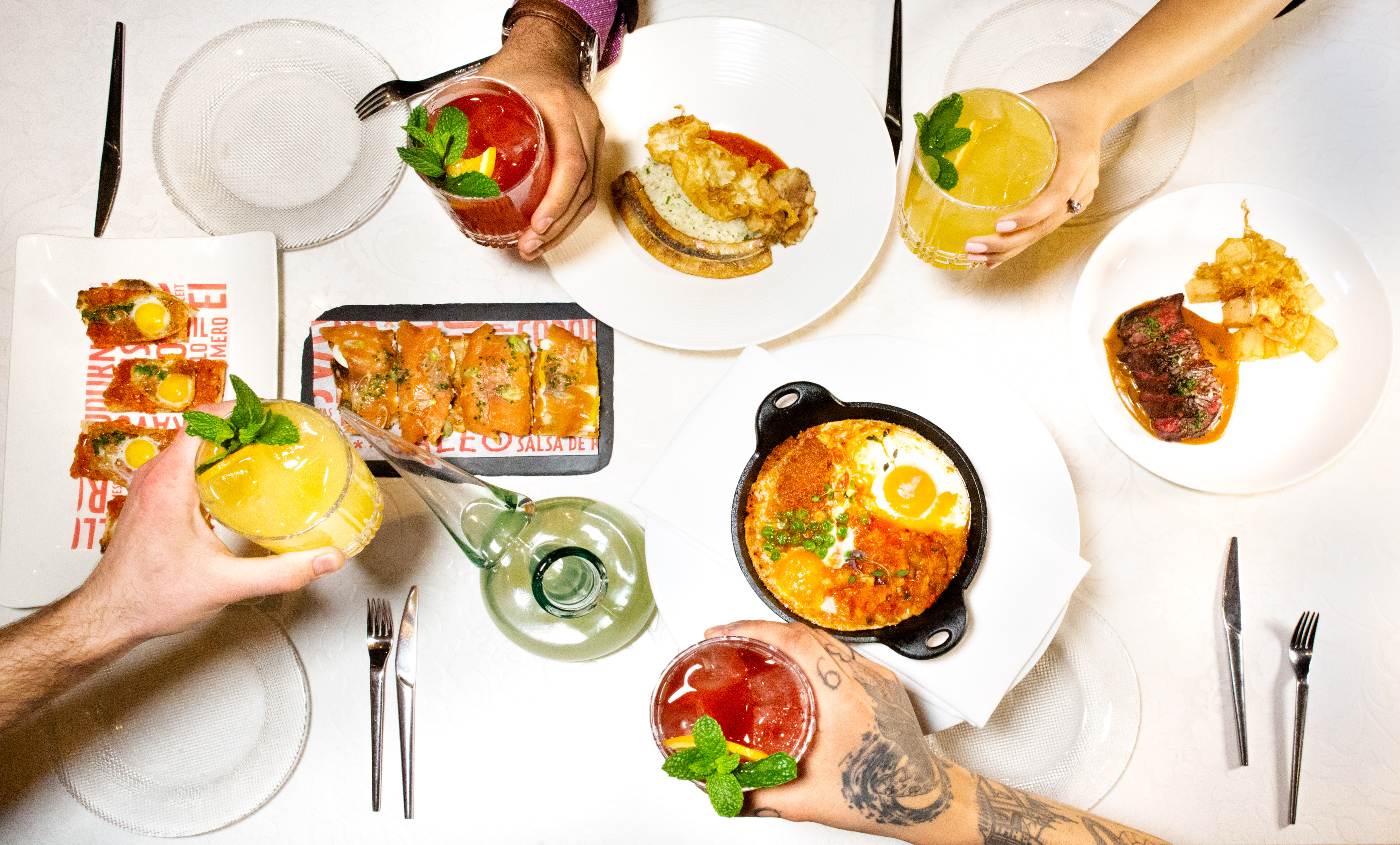 An overhead view of brunch dishes at Jaleo