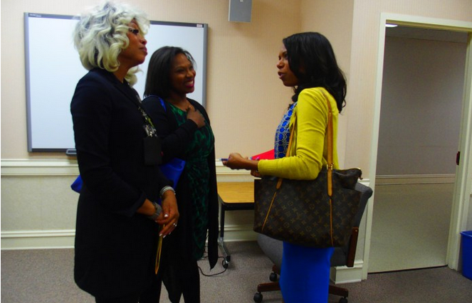 From left: Sharon Griffin, regional superintendent of the Innovation Zone in Memphis, speaks with iZone adviser Ashleigh Dennis and Kameelah Shaheed-Diallo, a vice president with The Mind Trust, a nonprofit education organization based in Indianapolis.