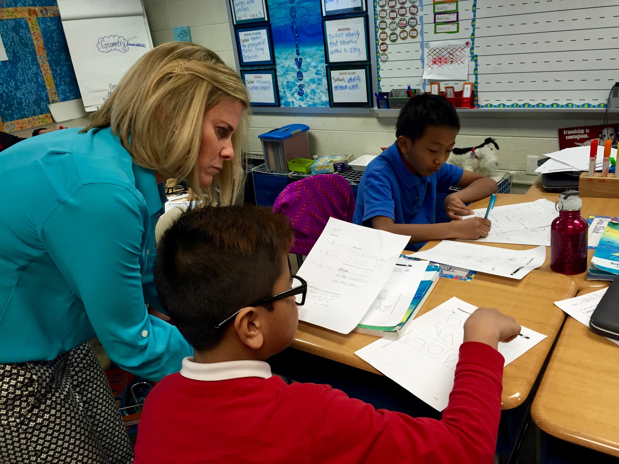 Angie Kendall, a master teacher at Southport Elementary School, works with a student. The school received an A from the state this year.